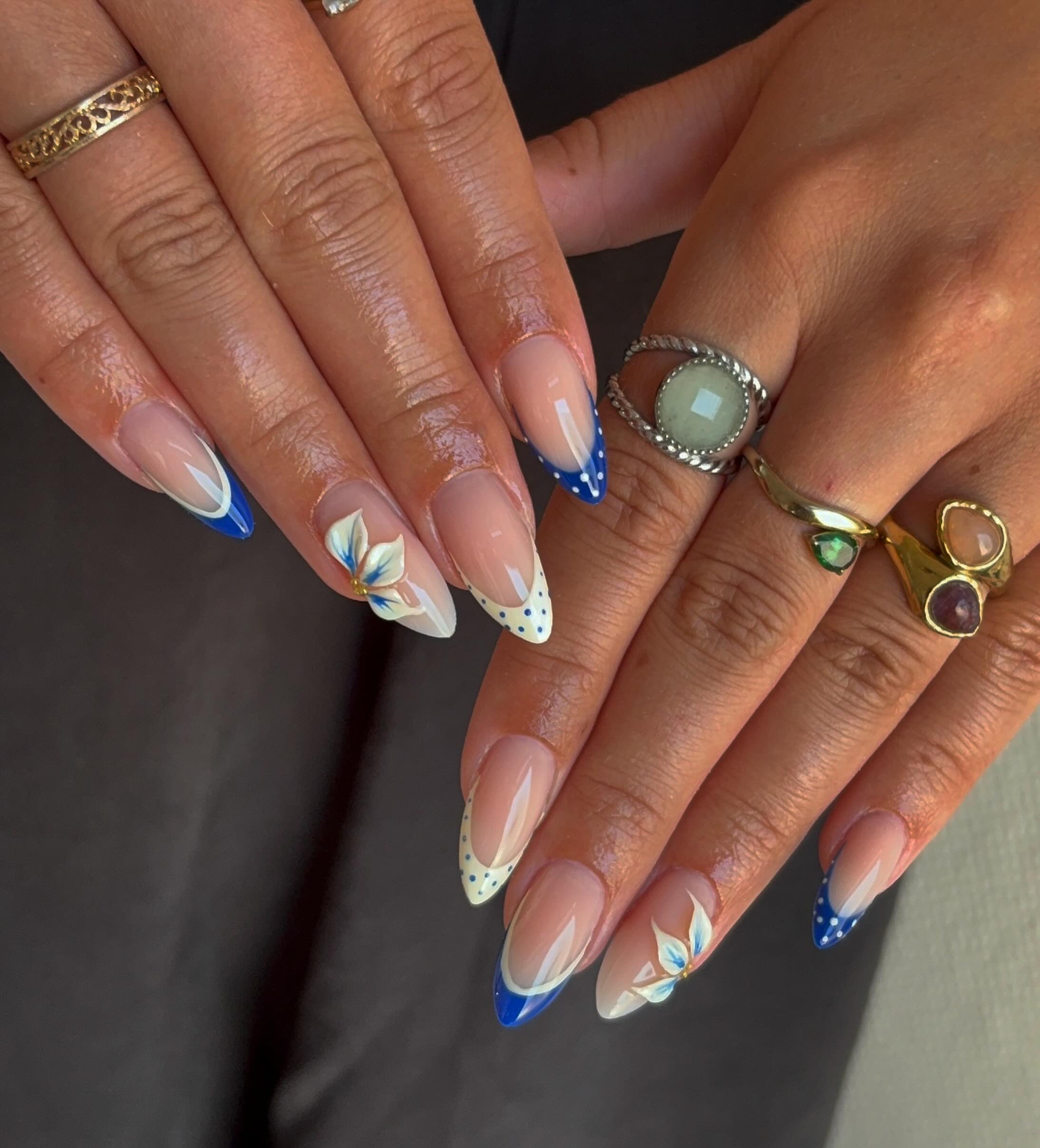 27 End of Summer Nail Ideas for 2026 28 Blue Daisy French Tip Almond Nails