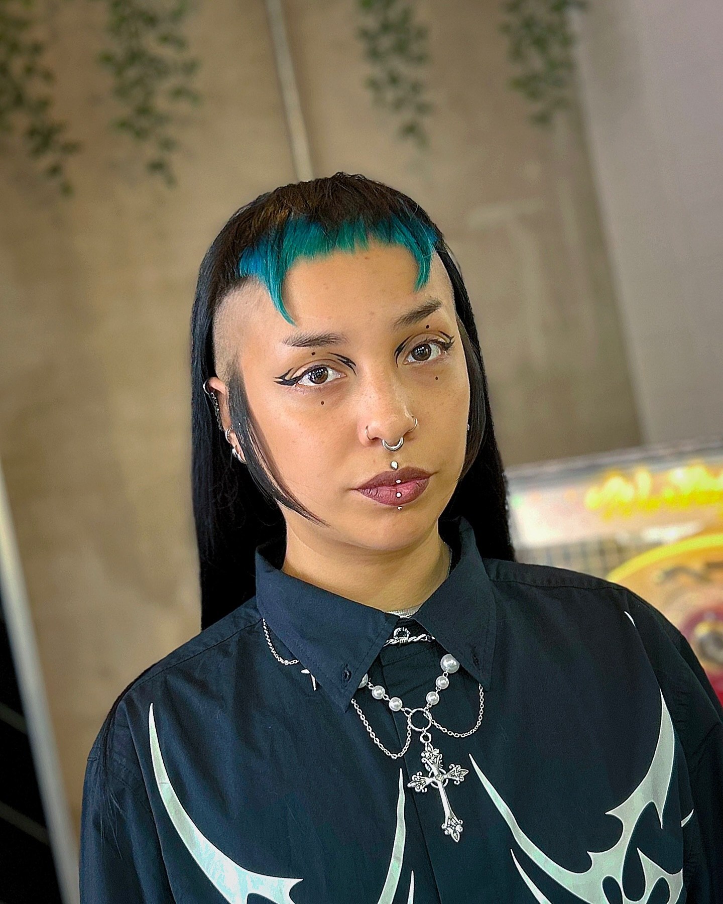 Bold Blue Streak Undercut with Long Black Hair