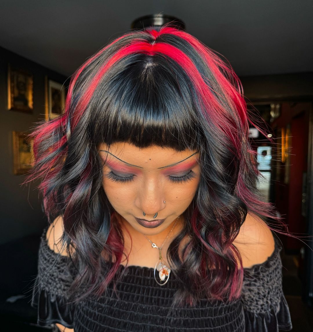 25 Witch Hairstyles 2026: Enchant Your Look 23 Bold Red Streaks On Dark Wavy Bob