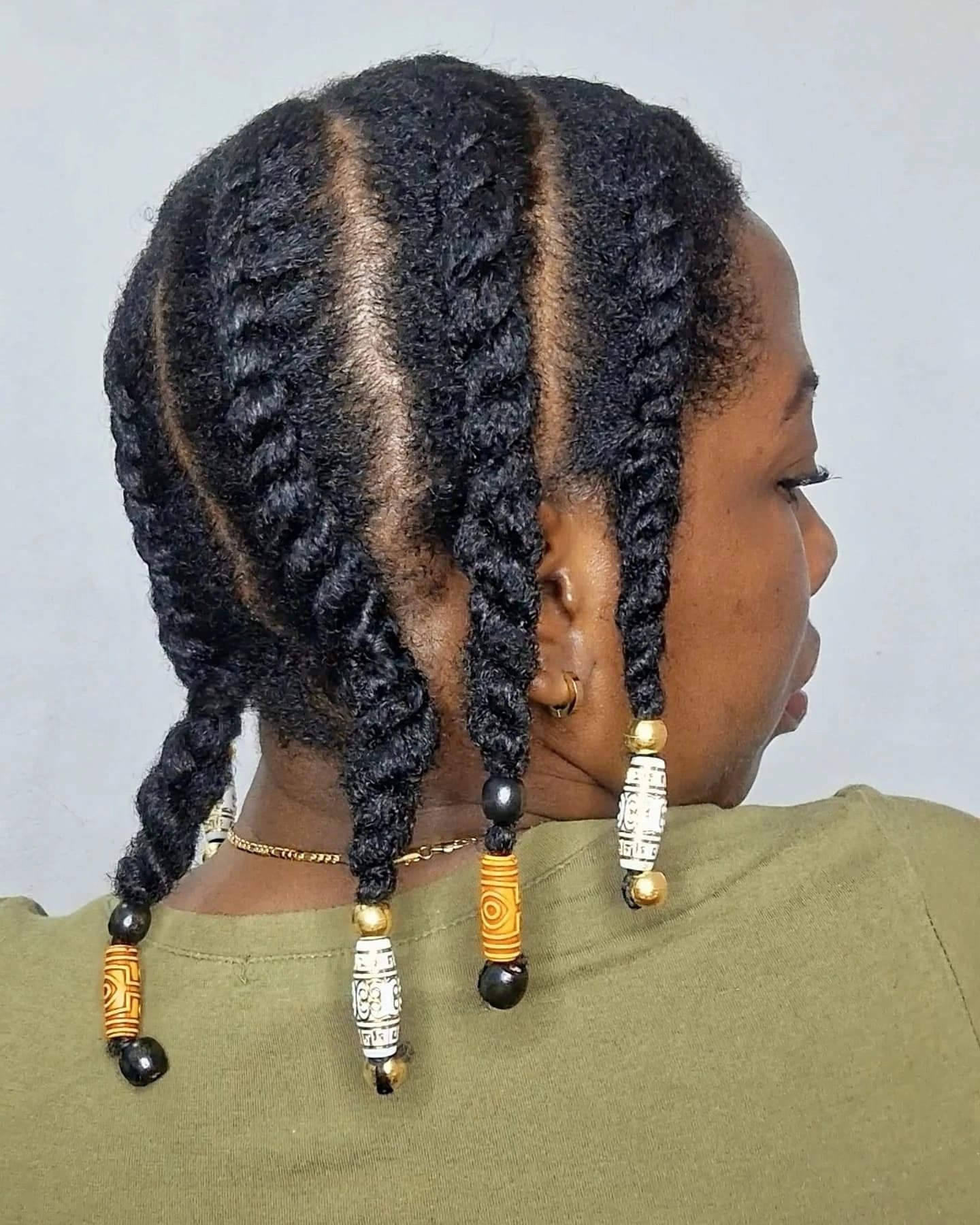 25 Protective Styles for Natural Hair Trends 2026 6 Braided Tribal Vibes With Wooden Beads