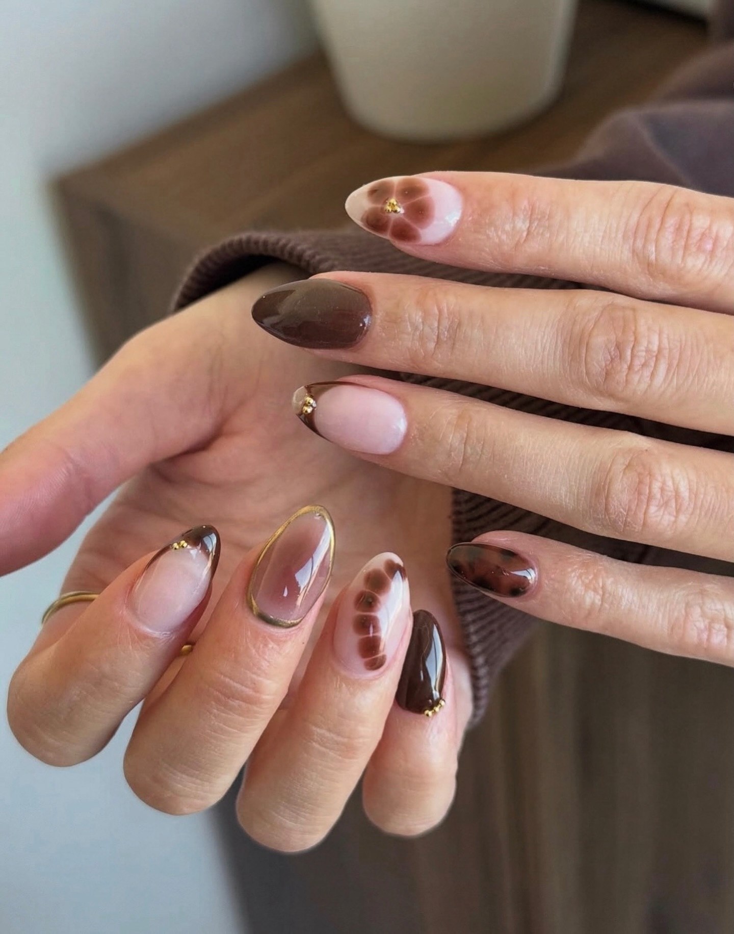 25 Fall Nail Ideas You Need to Try in 2026 22 Brown Tortoiseshell and Glossy Aura French Tips