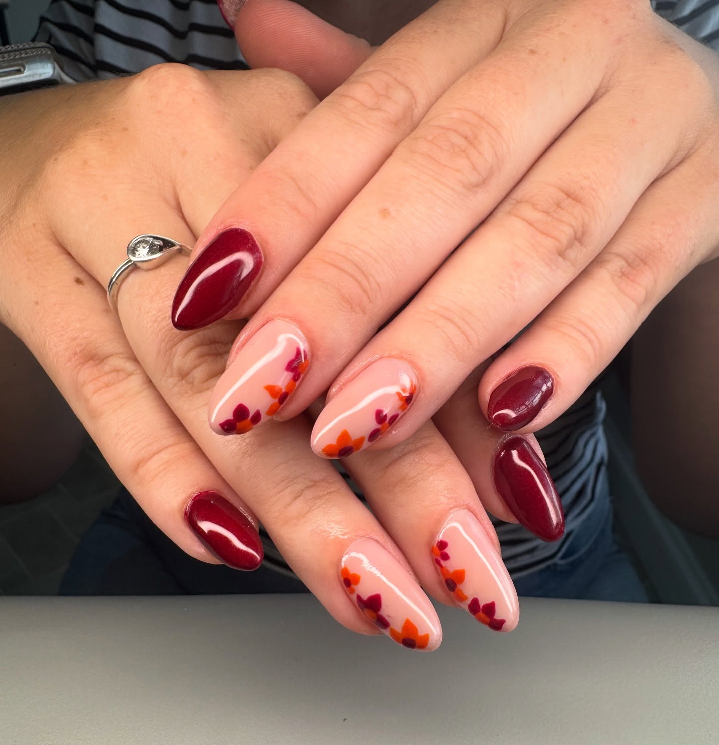 Burgundy & Nude Floral Almond Nails