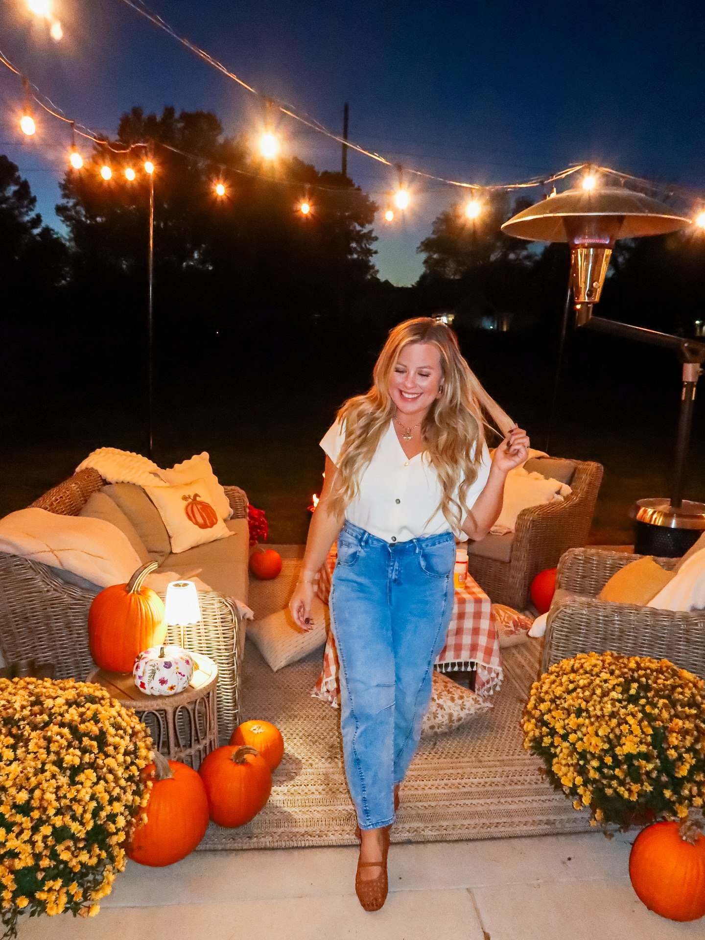 25 Fall Party Outfit Ideas You Need for 2026 15 Casual Chic White Top And Blue Jeans Outdoor Party Look