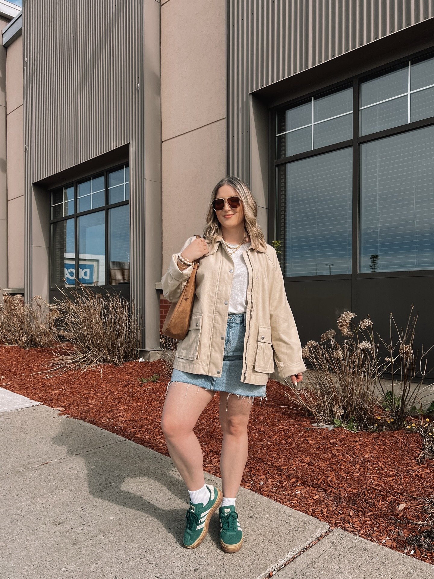 25 Fall Party Outfit Ideas You Need for 2026 12 Casual Utility Jacket And Denim Mini Skirt