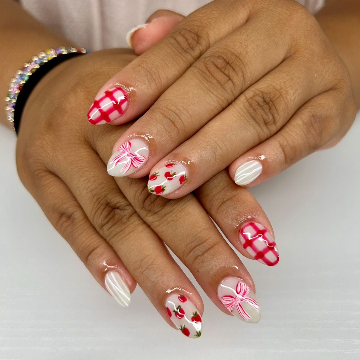 25 Back to School Nail Ideas for 2026 9 Cheery Strawberry & Gingham Almond Nails