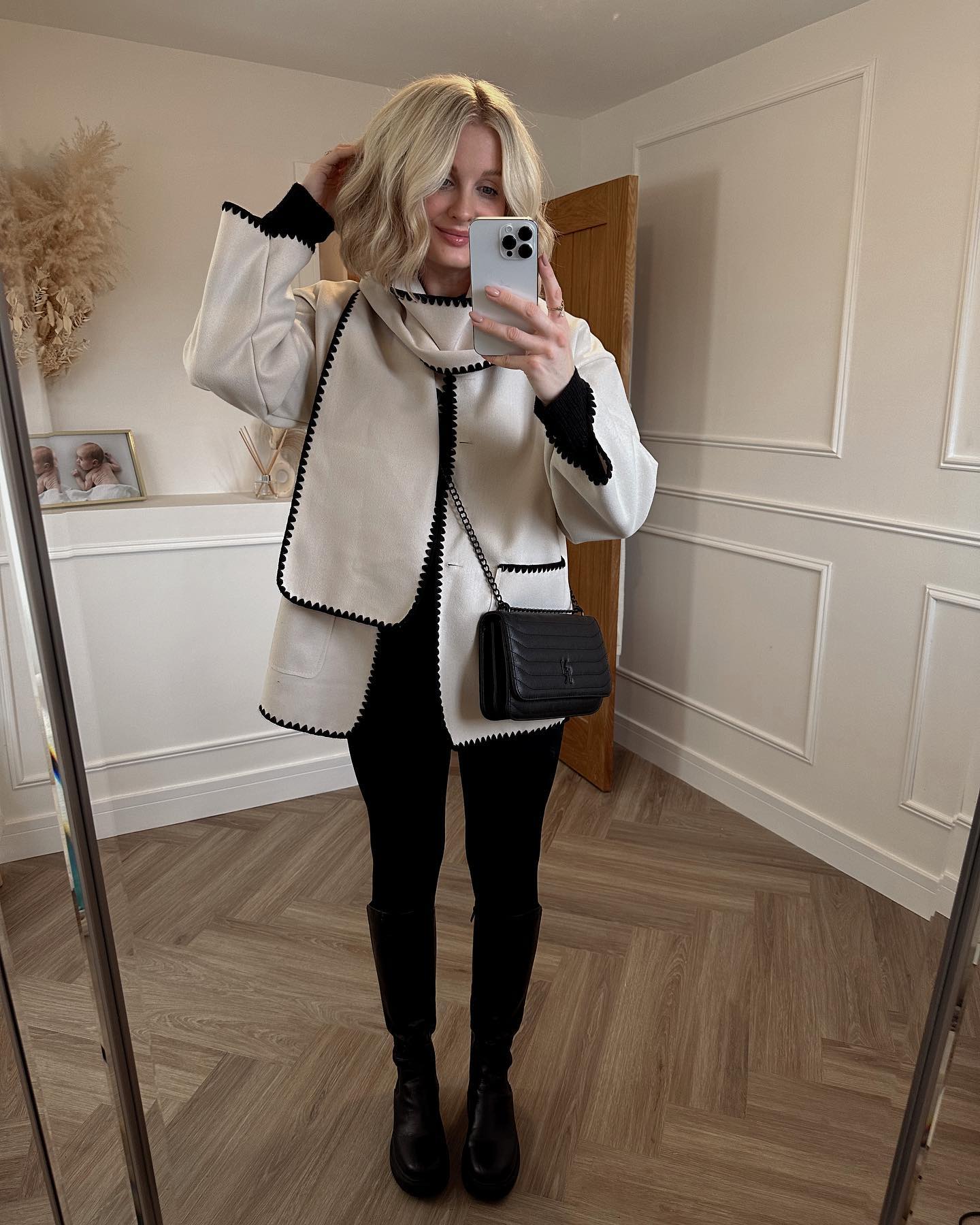 27 Leggings Outfits for 2026 You Need to See Now 10 Chic Black Leggings With Textured Cream Jacket