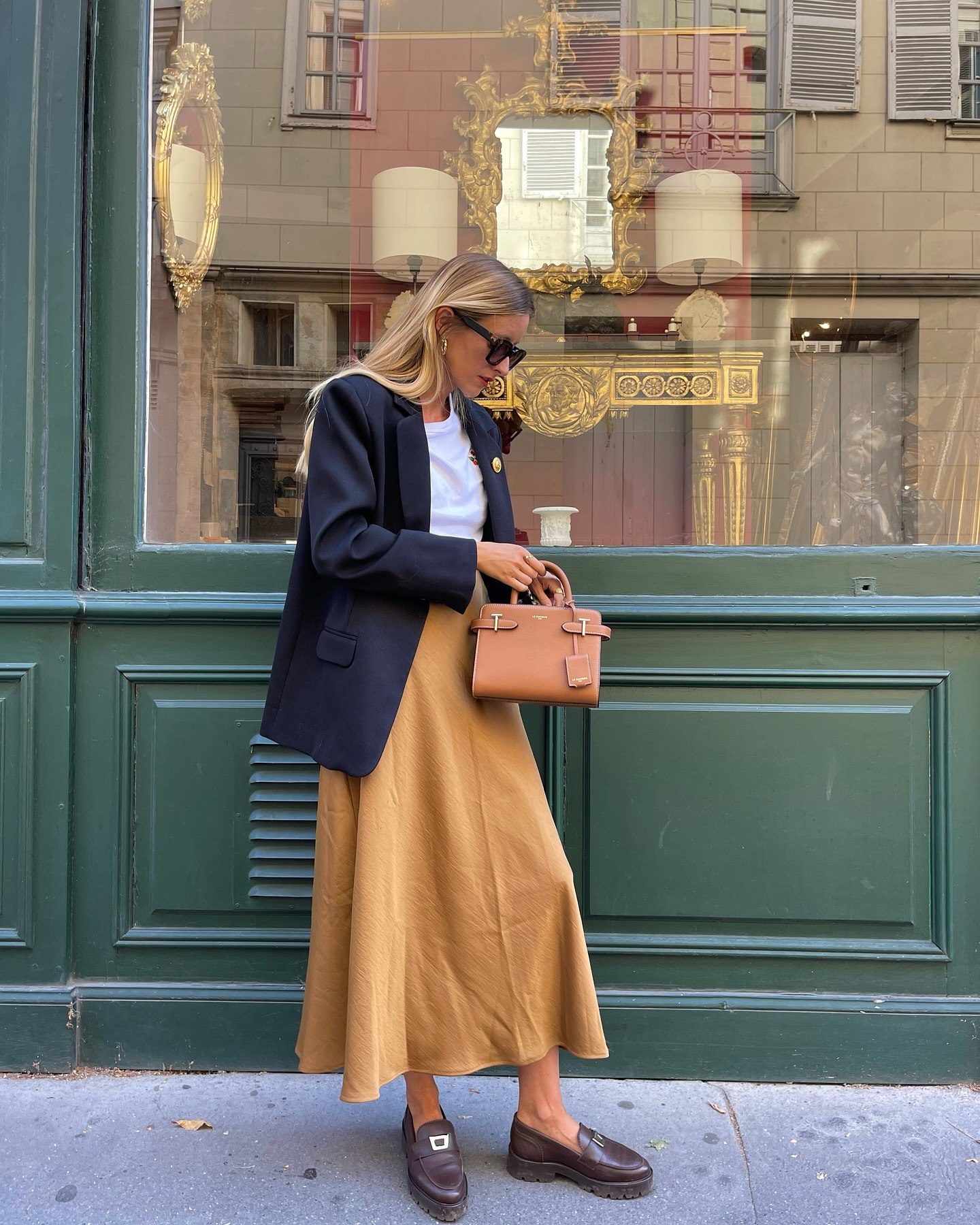26 Blazer Outfit Ideas You Need for 2026 4 Chic Navy Blazer and Camel Skirt Combo