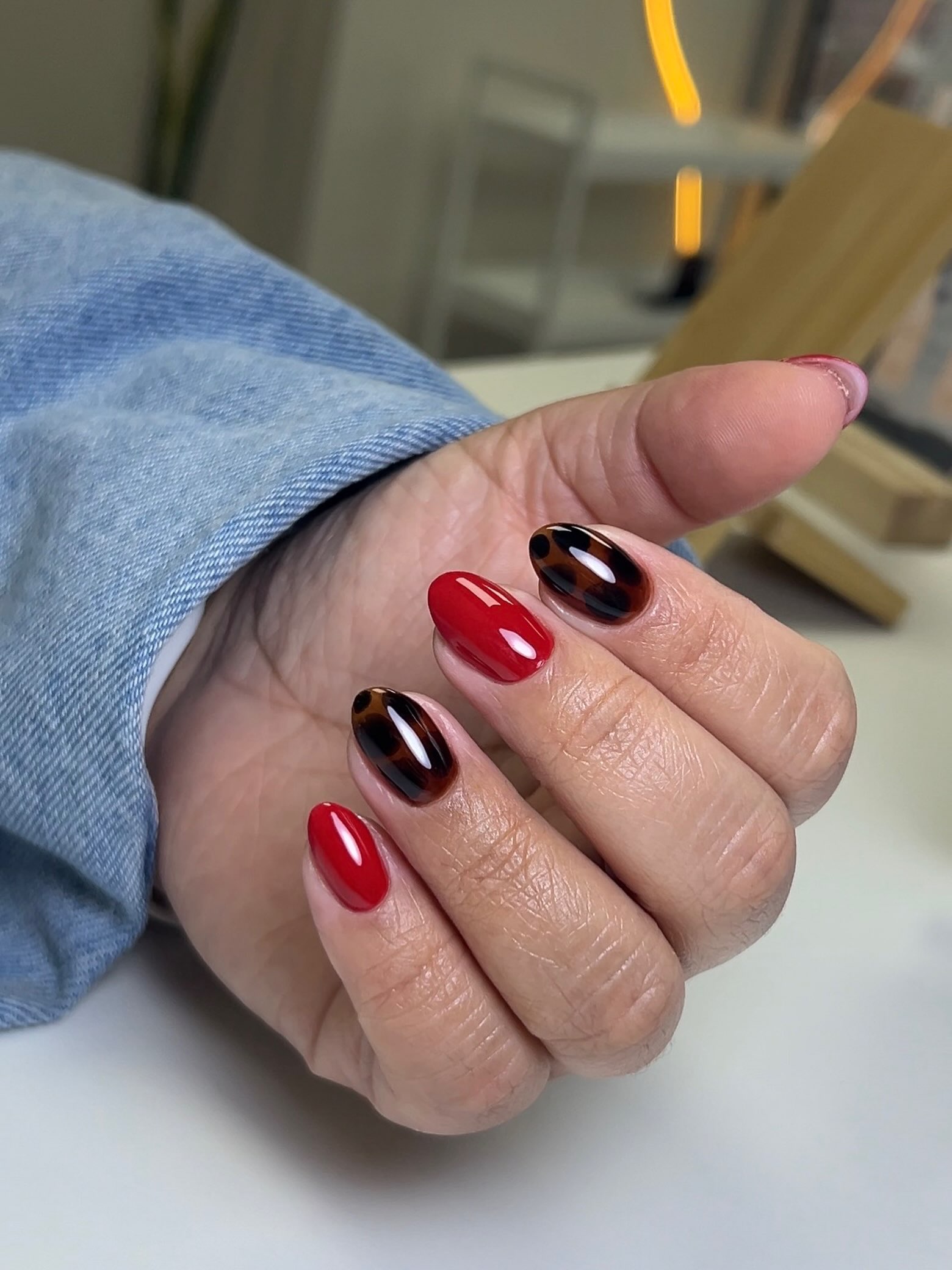 Chic Tortoiseshell and Red Almond Nails