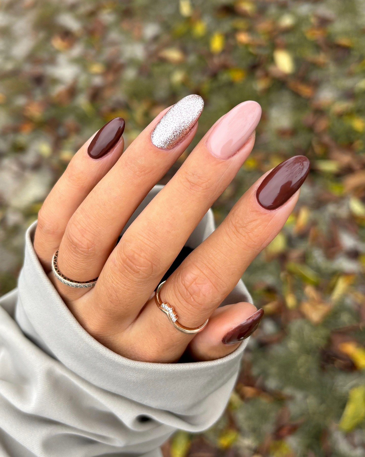25 Fall Nail Ideas You Need to Try in 2026 18 Chocolate And Pink Sparkle Almond Nails