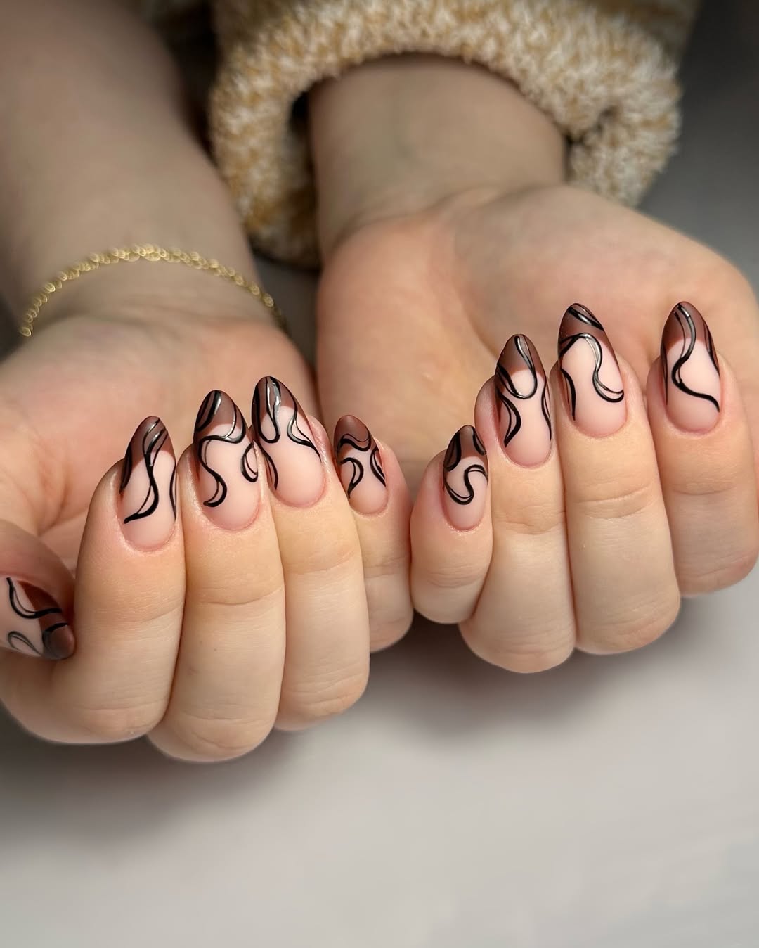 Chocolate Swirl Almond French Tip Nails