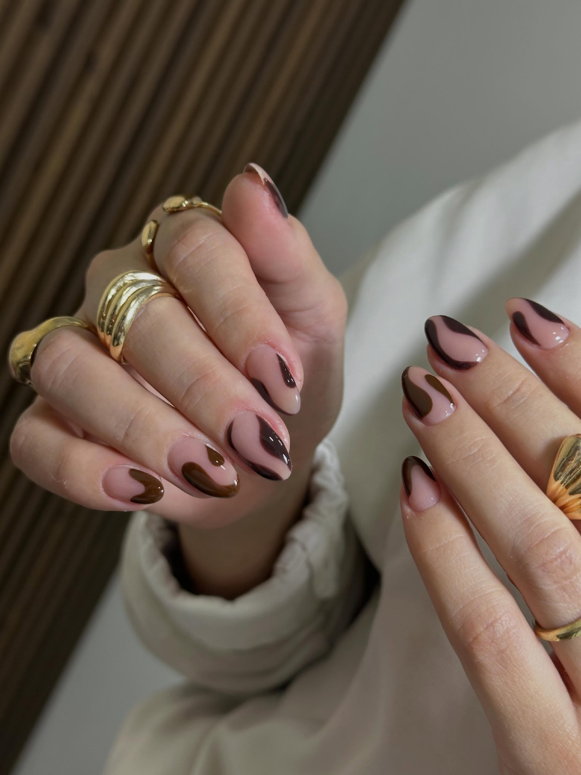 27 Chic Neutral Fall Nail Ideas You Need for 2026 18 Chocolate Swirl Almond Glossy Nails
