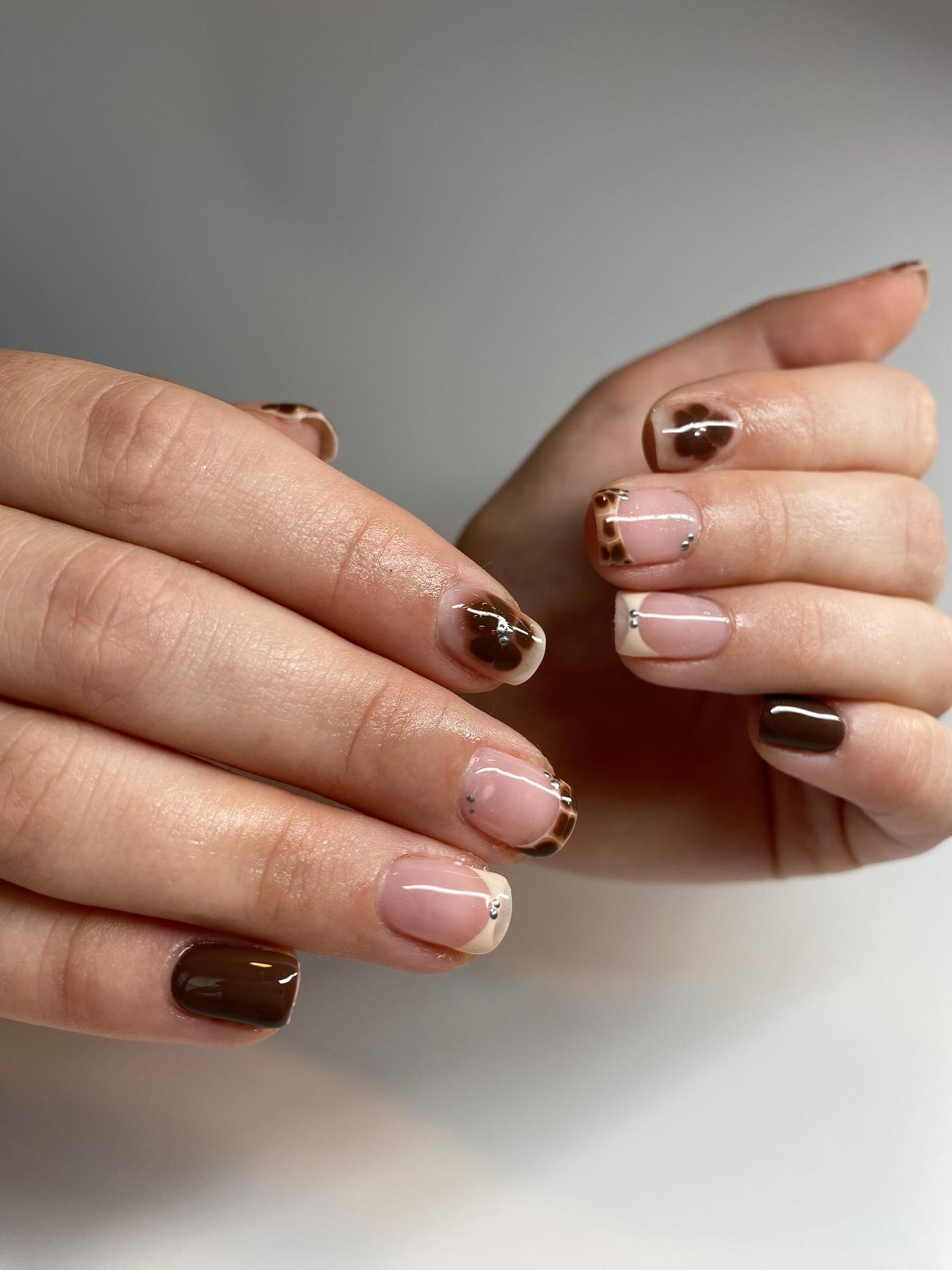 27 Must-Try Short Fall Nail Ideas for 2026 20 Chocolate Swirl French Almond Nails