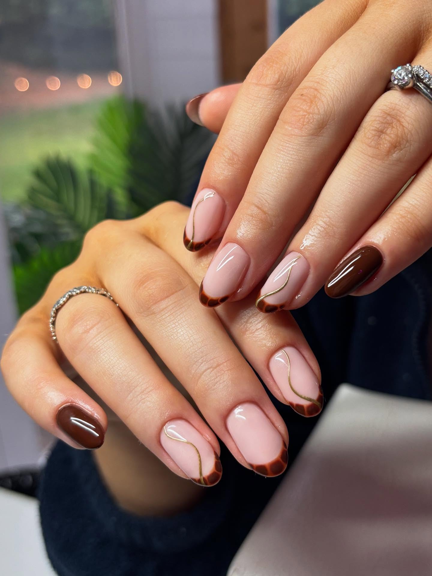 27 Must-Try Short Fall Nail Ideas for 2026 3 Chocolate Swirl French Tip Oval Nails