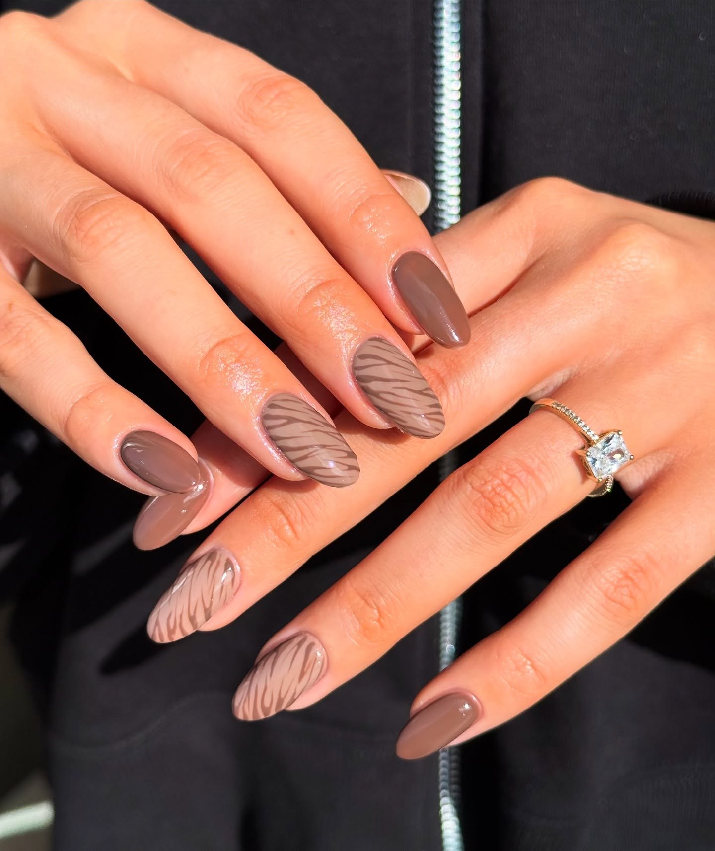 27 Chic Neutral Fall Nail Ideas You Need for 2026 25 Chocolate Zebra Print Almond Nails
