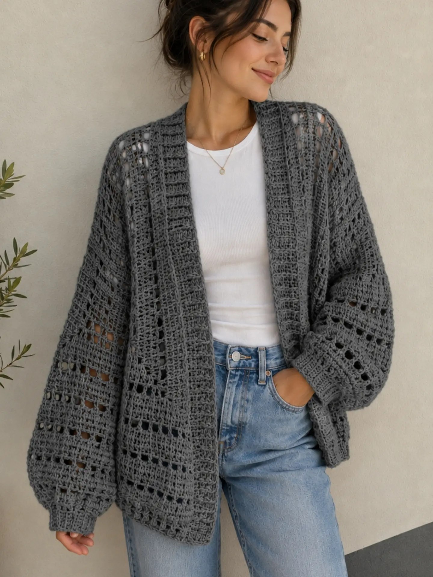 27 Cardigan Outfit Ideas You Need for 2026 20 Chunky Crochet Cardigan With Classic Denim
