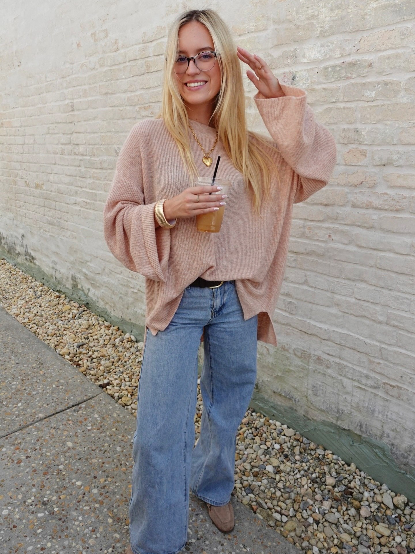 30 Transitional Fall Outfits You Need Now 28 Comfy Oversized Knit With Wide Leg Jeans