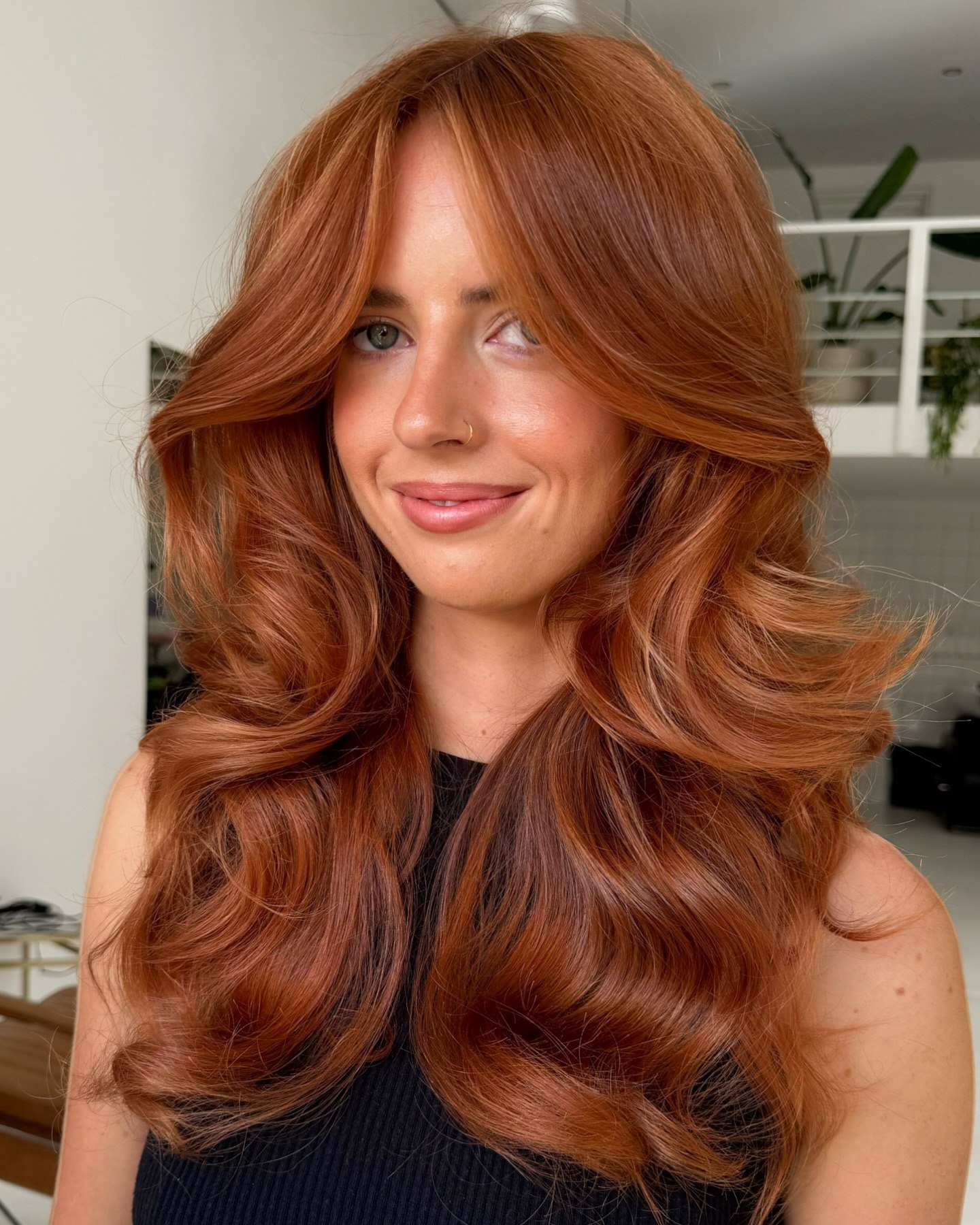 27 Red Hair Color Trends You Need for 2026 26 Copper Glow Voluminous Waves With Face-Framing