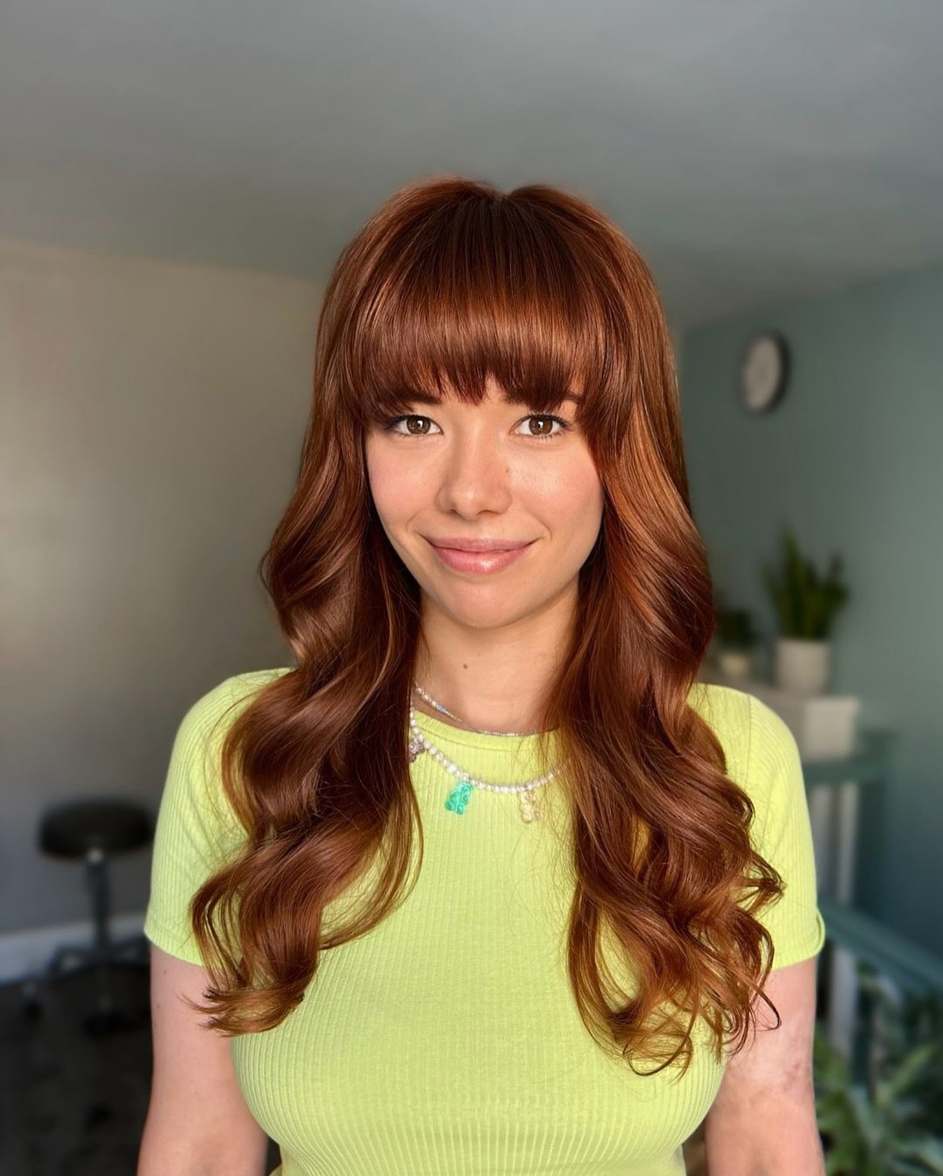 25 Stunning Brown Cinnamon Hair Color Ideas for 2026 10 Copper Red Waves With Full Fringe
