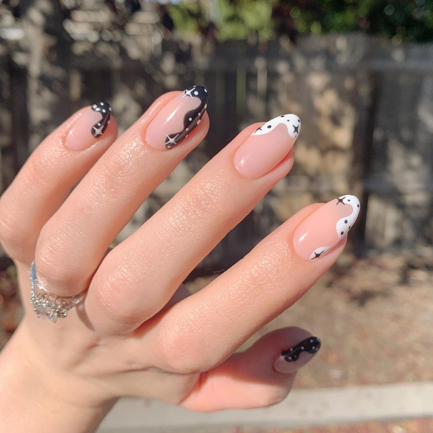 27 Chic Neutral Fall Nail Ideas You Need for 2026 15 Cosmic Swirl French Tip Almond Nails