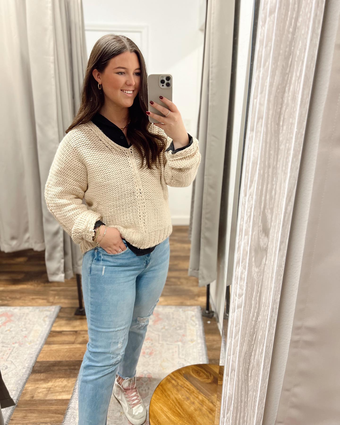 25 Fall Festival Outfits You Need for 2026 16 Cozy Cream Knit And Distressed Denim Casual Look