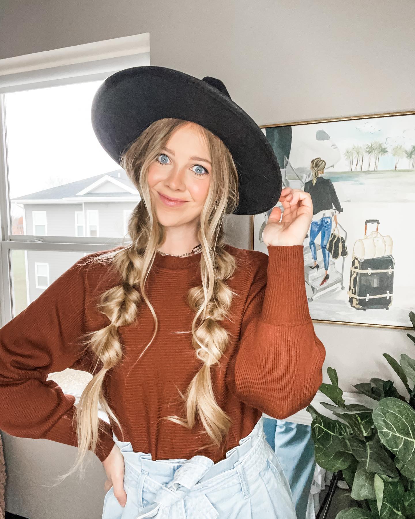 27 Stunning Fall Hairstyles You Need To Try In 2026 27 Cozy Rust Sweater With Light Wash Paperbag Jeans