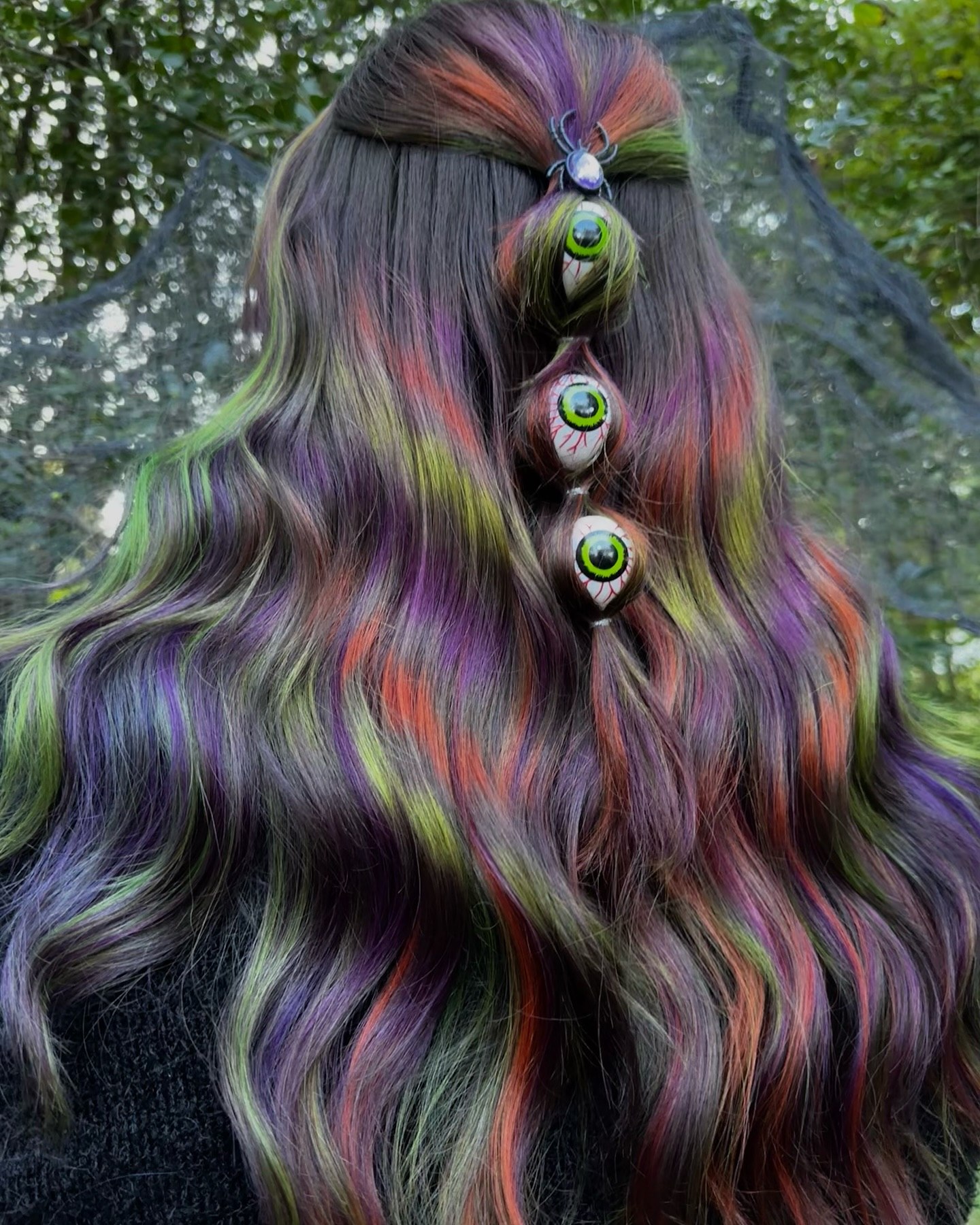 25 Spooktacular Halloween Hairstyles You Need to Try in 2026 3 Creepy Eye Candy Halloween Ponytail
