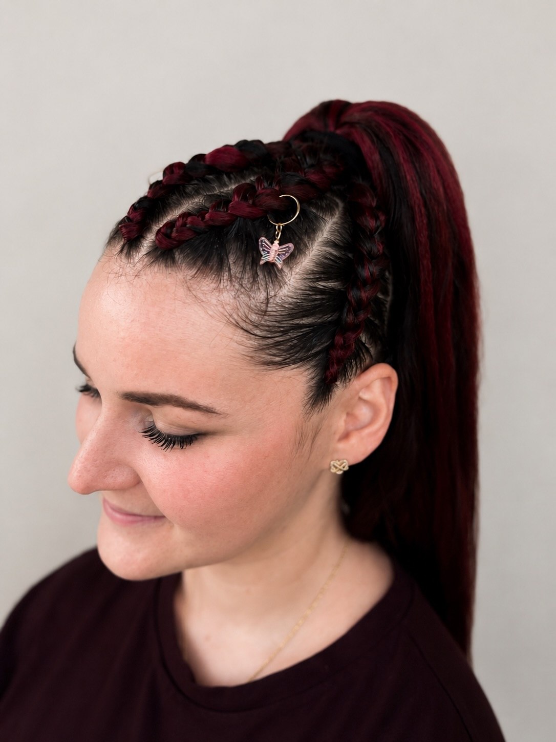 25 Witch Hairstyles 2026: Enchant Your Look 25 Crimson Braids With Butterfly Charm Accent