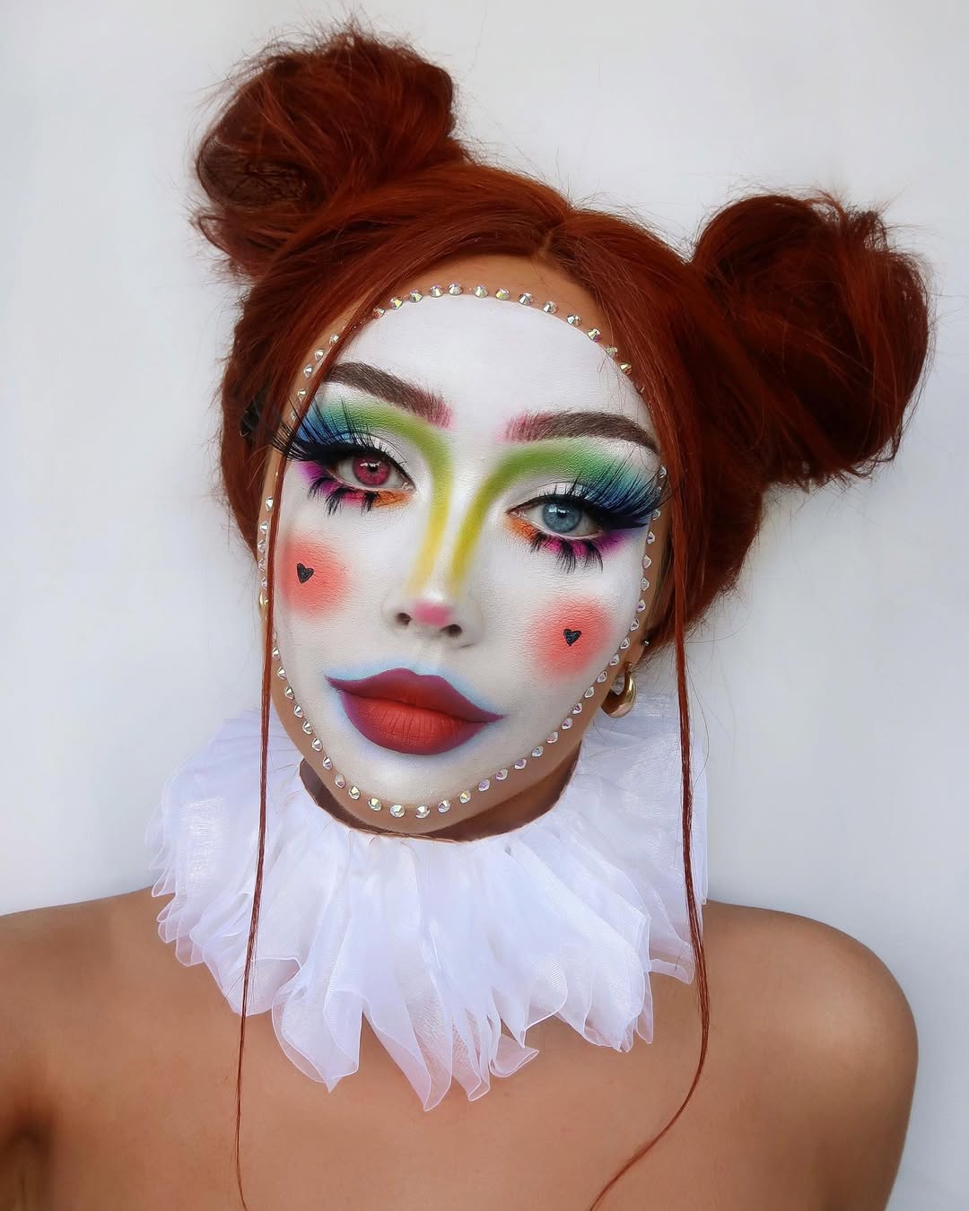 25 Wild Clown Hairstyles for 2026 You Need to See 10 Crimson Double Buns with Wispy Face-Framing Strands