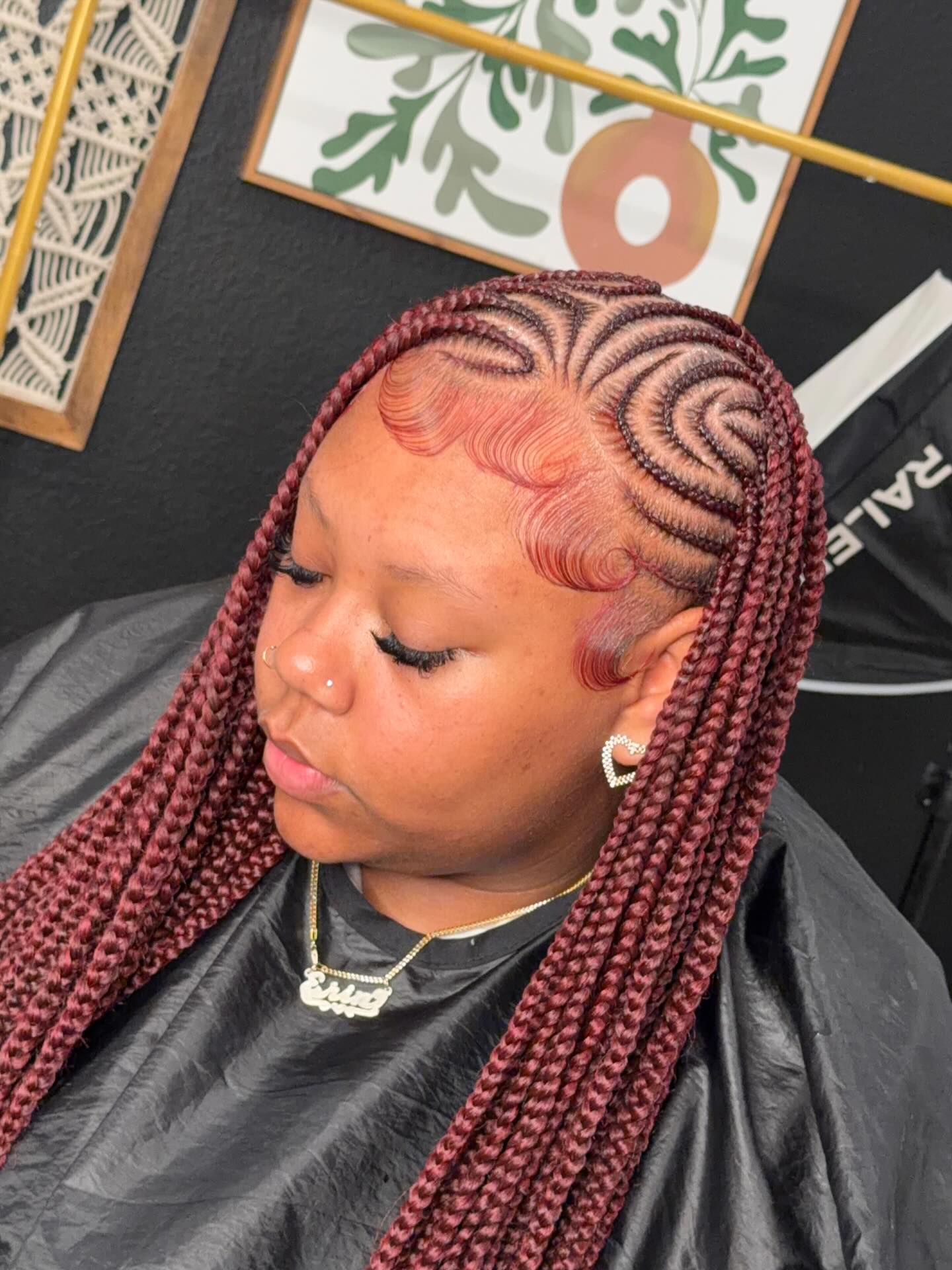 26 Stunning Fulani Braids Hairstyles for 2026 22 Crimson Swirl Fulani Braids With Defined Edges
