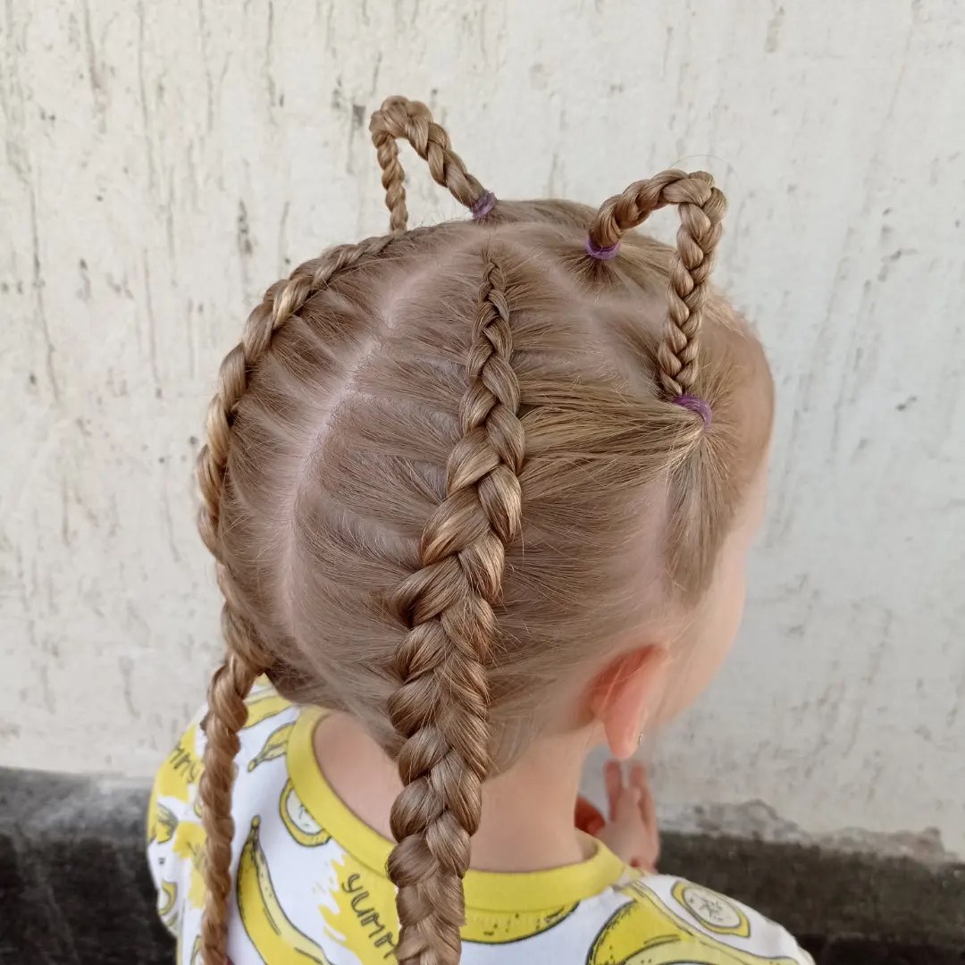 27 Spooktacular Halloween Hairstyles for Kids 2026 24 Cute Braided Cat Ears Twists For Kids