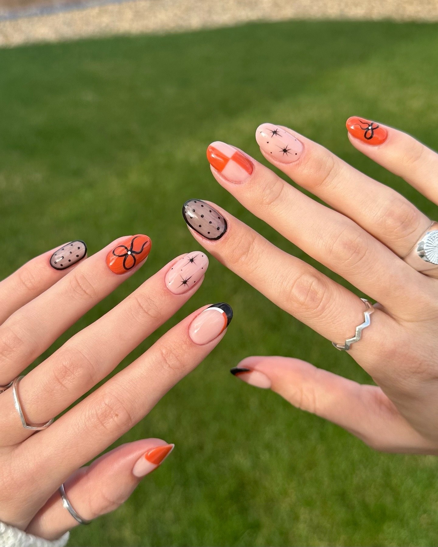 27 Must-Try Short Fall Nail Ideas for 2026 13 Cute Orange and Black Abstract Fall French Tips