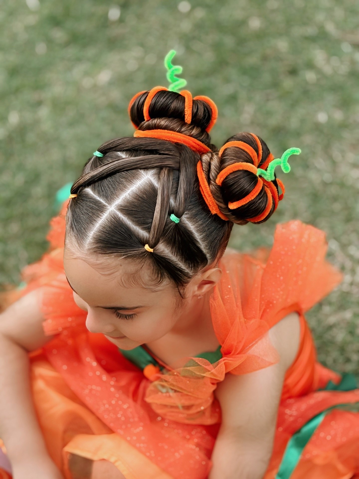 27 Spooktacular Halloween Hairstyles for Kids 2026 10 Cute Pumpkin Halloween Hair Buns 2026