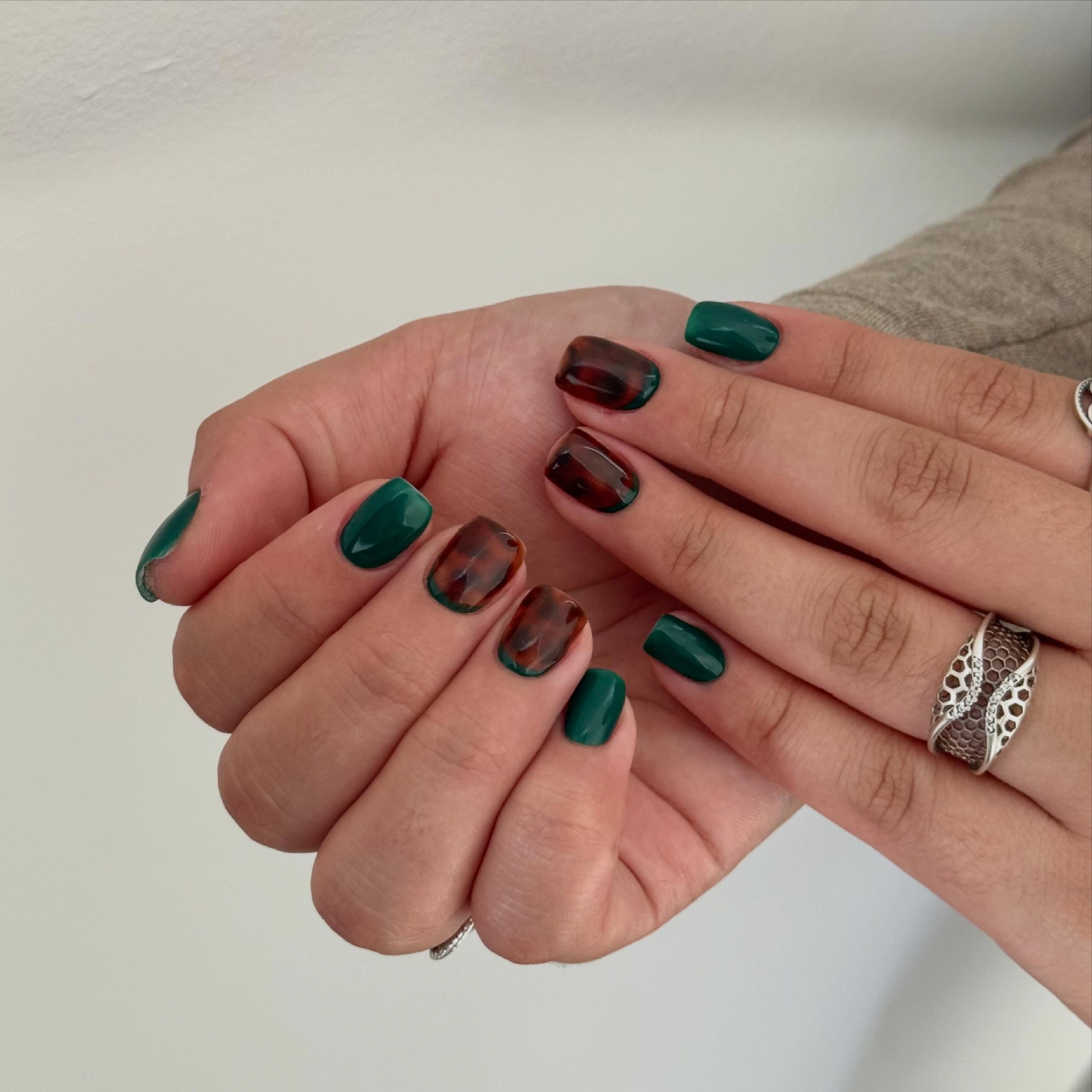 27 Must-Try Short Fall Nail Ideas for 2026 10 Dark Green & Tortoiseshell Mix Short Square Nails