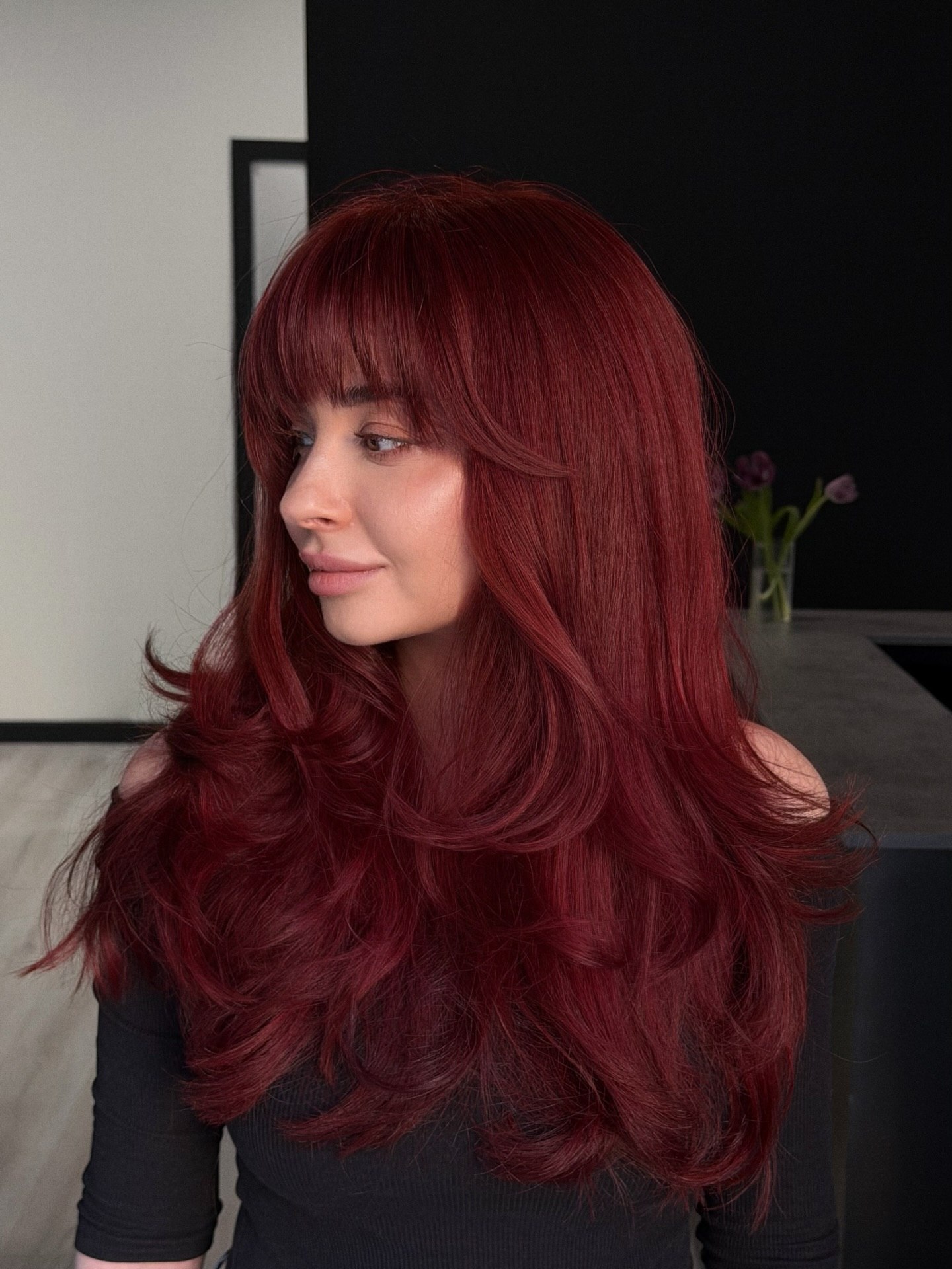 27 Red Hair Color Trends You Need for 2026 4 Deep Cherry Cola Waves With Face-Framing Bangs