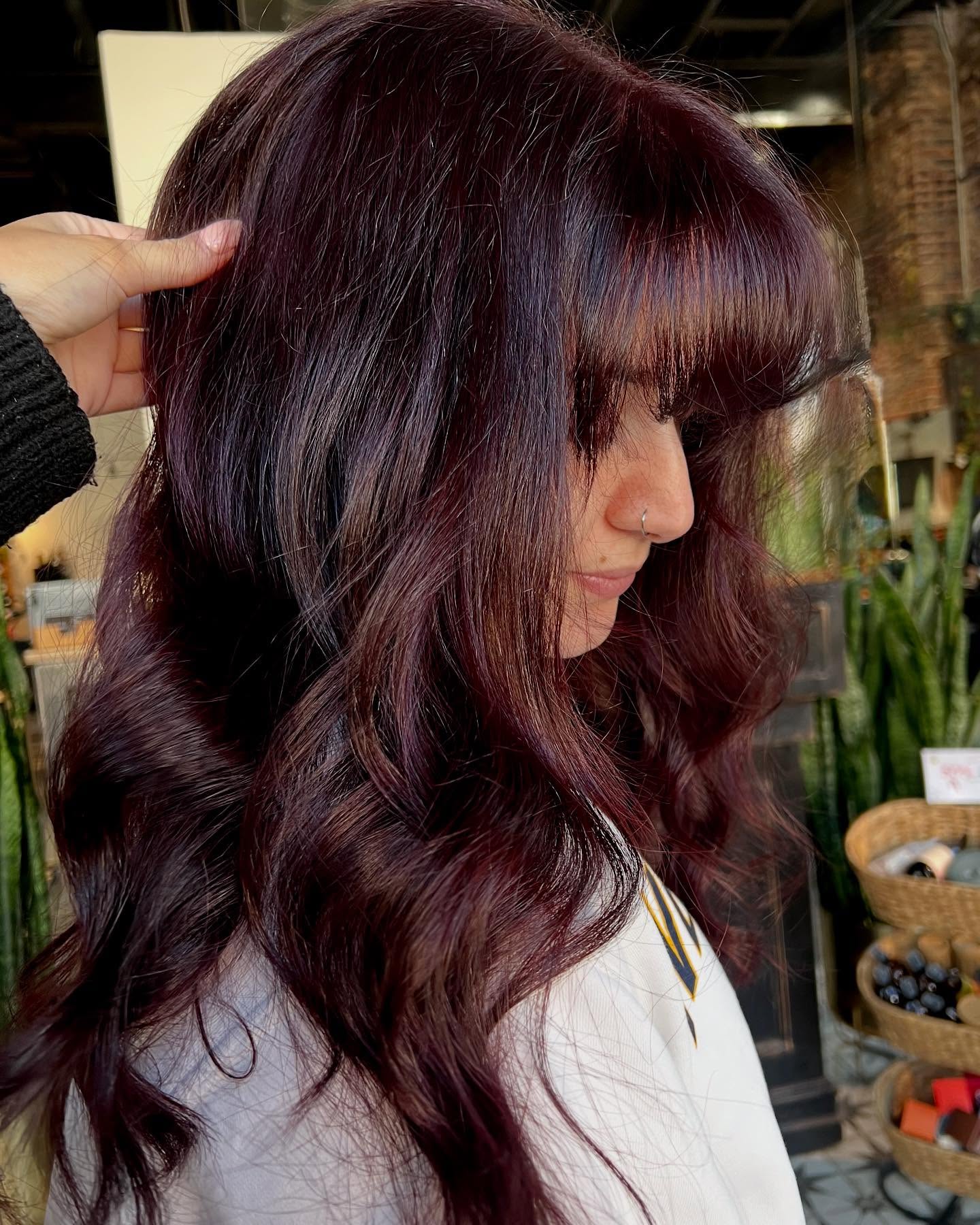 25 Cherry Cola Hair Colors Taking Over 2026 13 Deep Cherry Cola Waves With Wispy Bangs