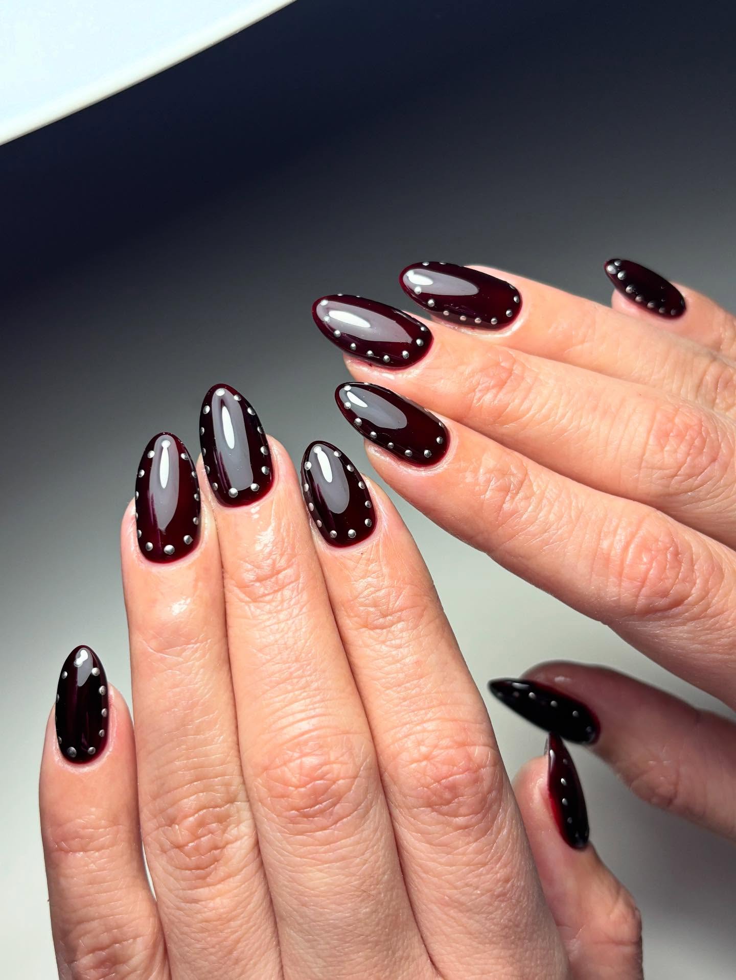 Deep Cherry Studded Almond Nails