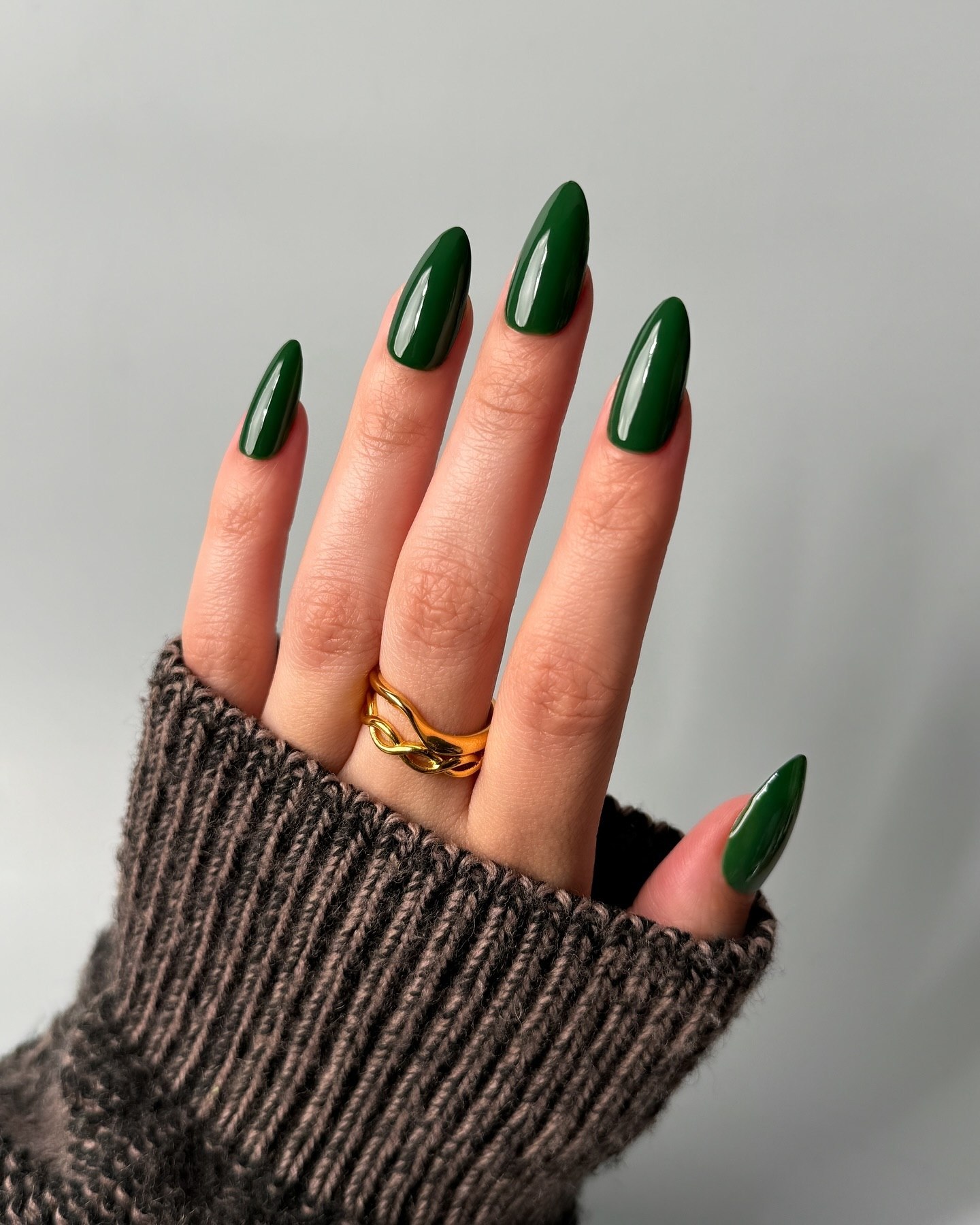 Deep Emerald Glossy Almond Nails
