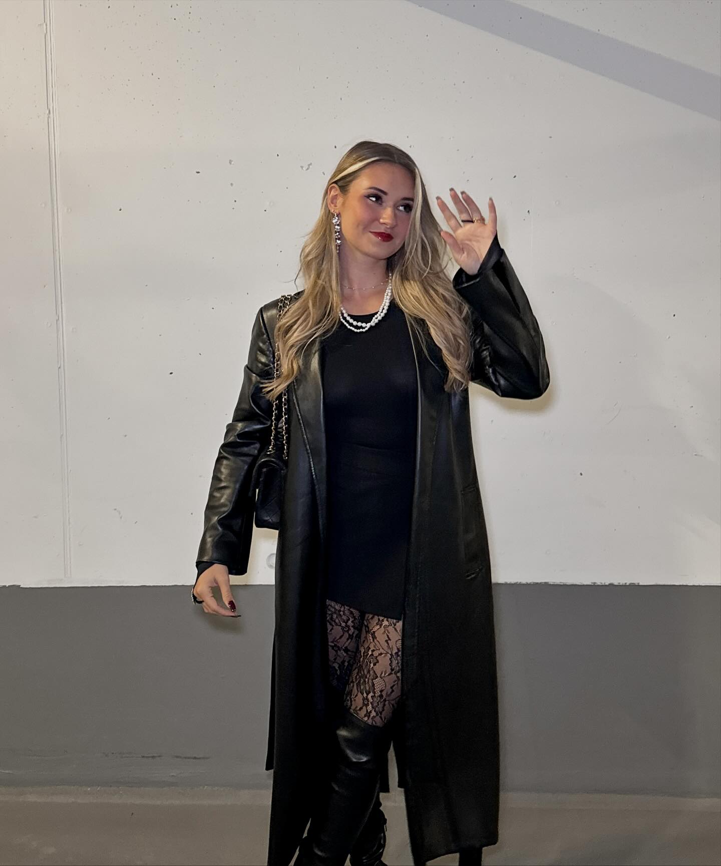 27 Spooktacular Halloween Outfits You Need for 2026 4 Edgy Black Leather Trench With Lace Accents