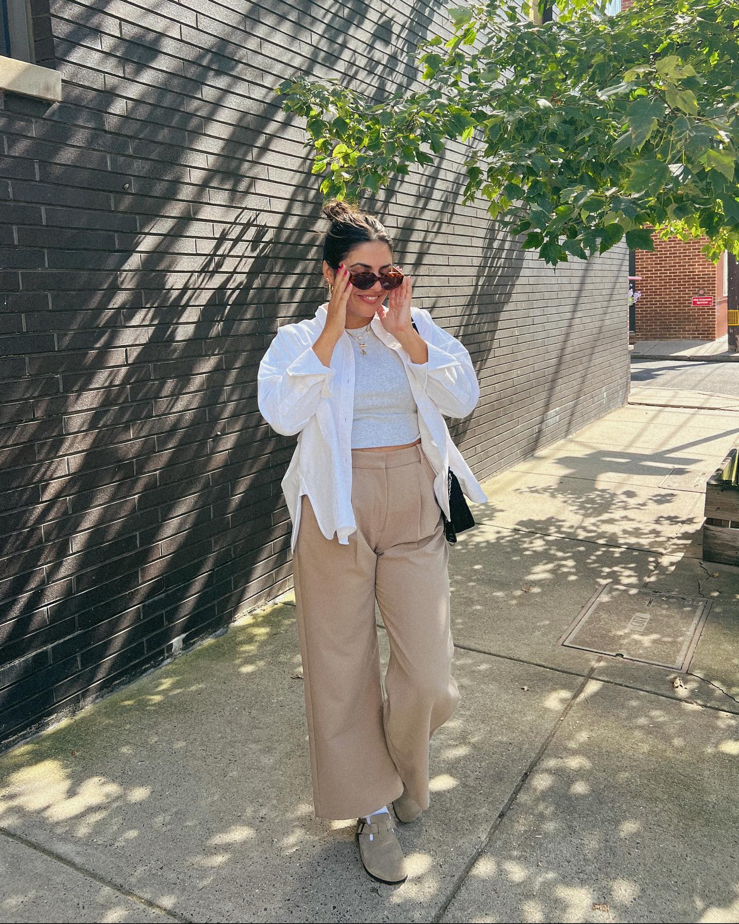 30 Transitional Fall Outfits You Need Now 5 Effortless Layers Cream Button-Down With Wide Leg Trousers