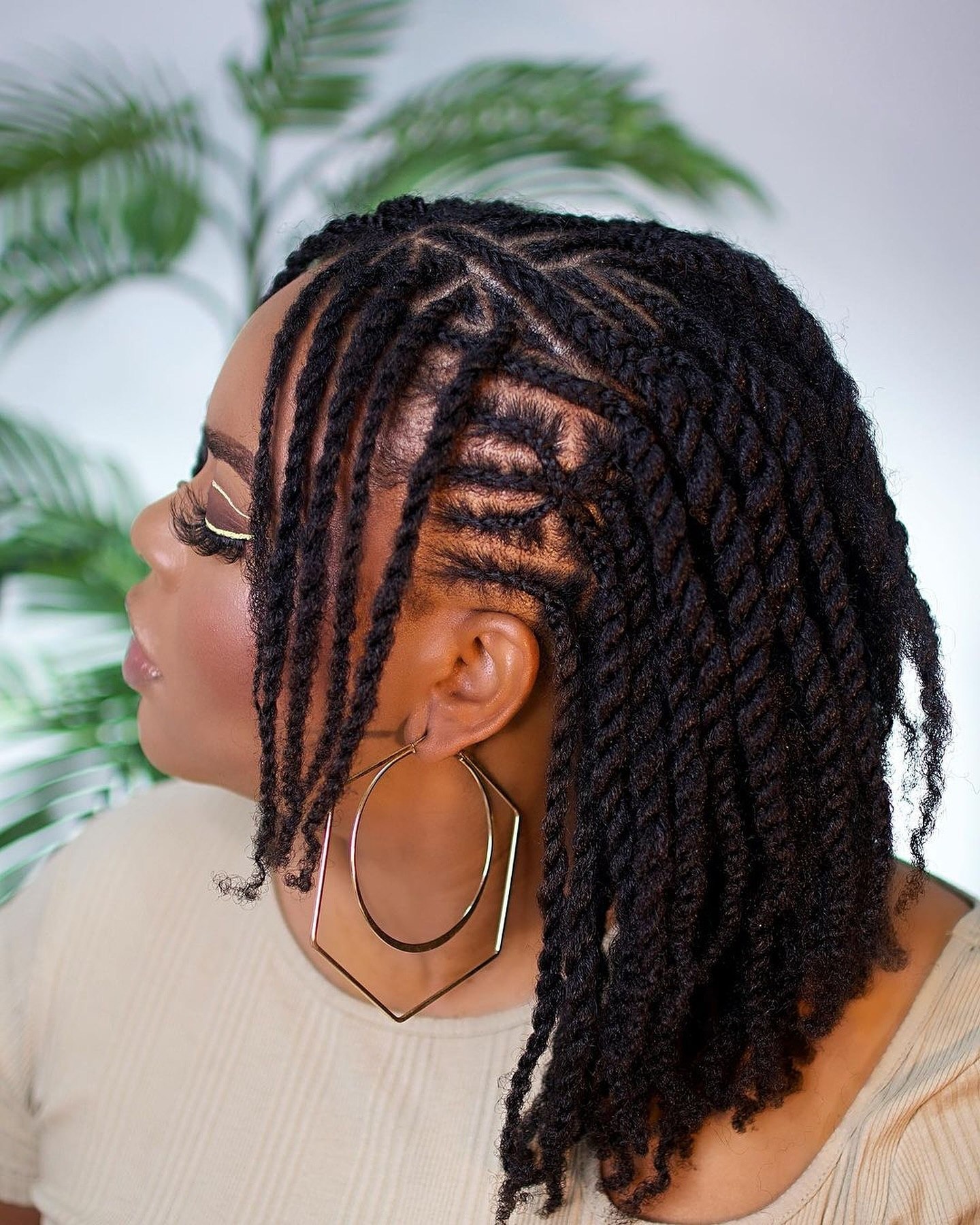 25 Protective Styles for Natural Hair Trends 2026 7 Elegant Two-Tone Twists With Defined Parts