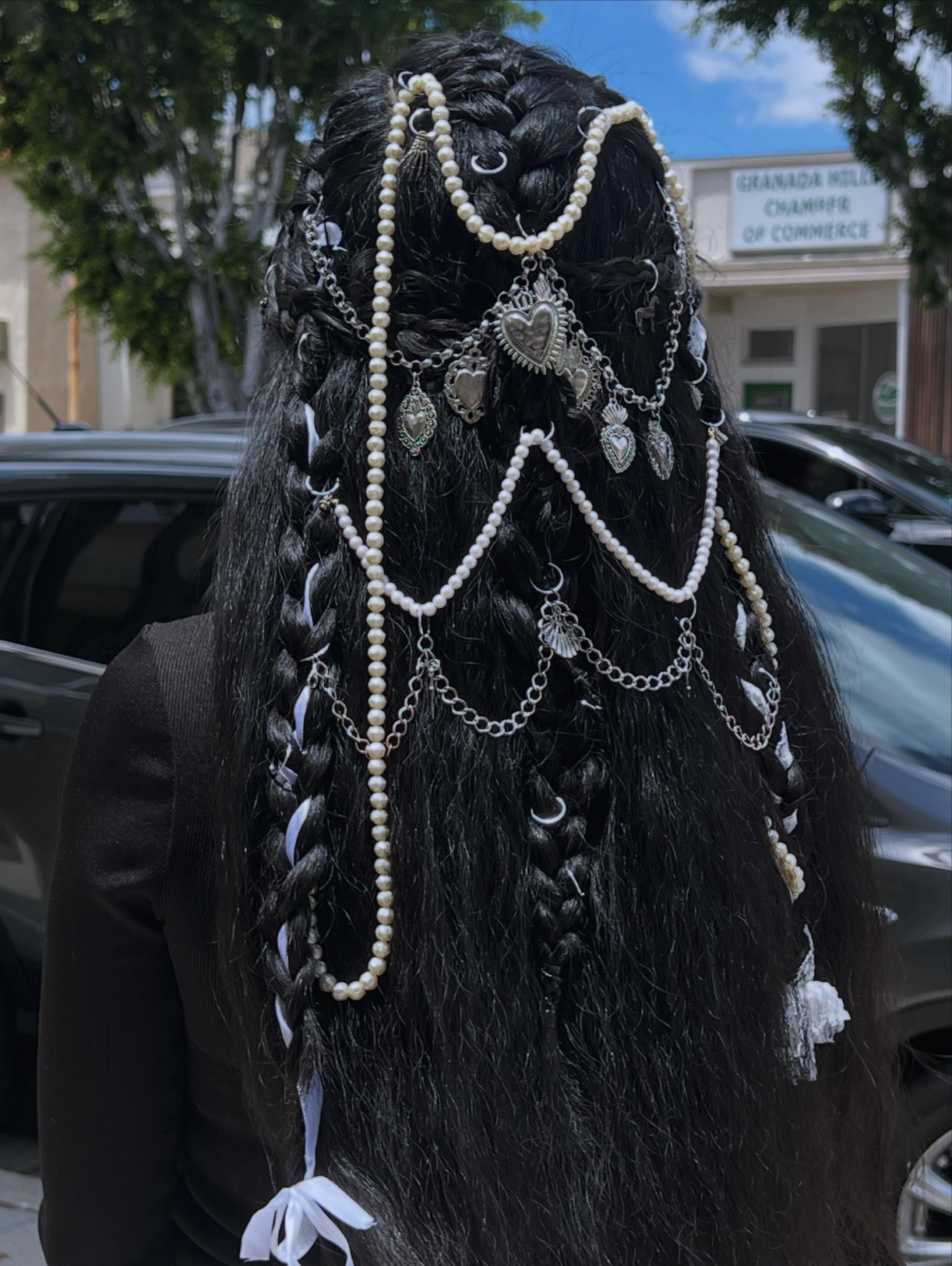 25 Witch Hairstyles 2026: Enchant Your Look 7 Enchanted Braids With Pearl and Chain Adornments