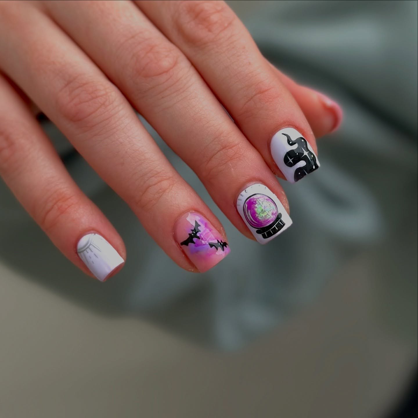 27 Must-Try Short Fall Nail Ideas for 2026 22 Enchanted Crystal Ball and Bat Nail Art