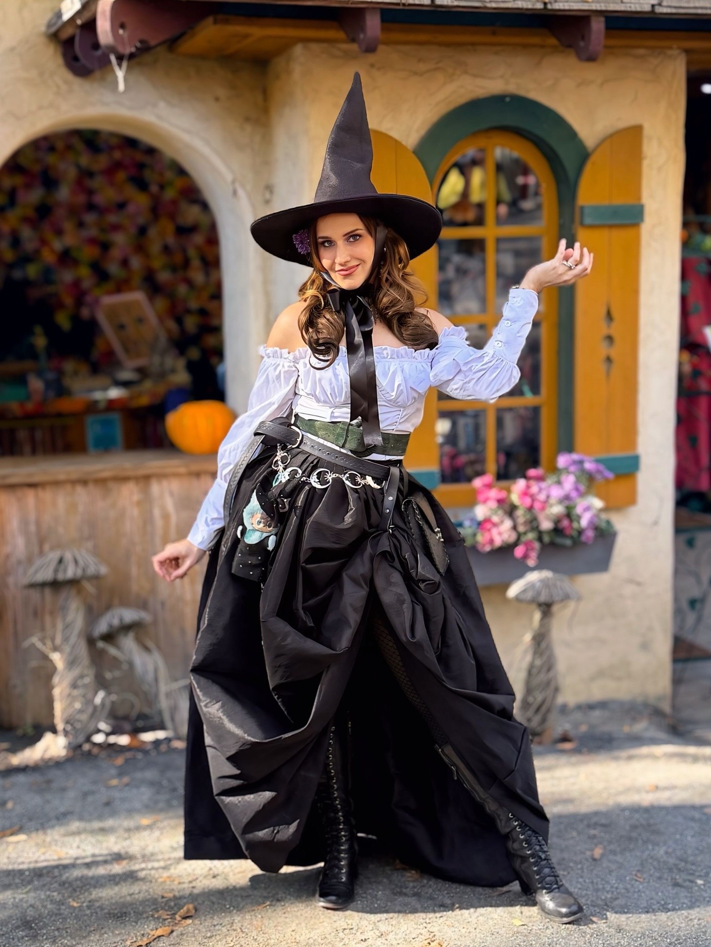 25 Witchy Outfit Ideas for 2026 9 Enchanting Witchy Off-Shoulder White Blouse And Black Voluminous Skirt