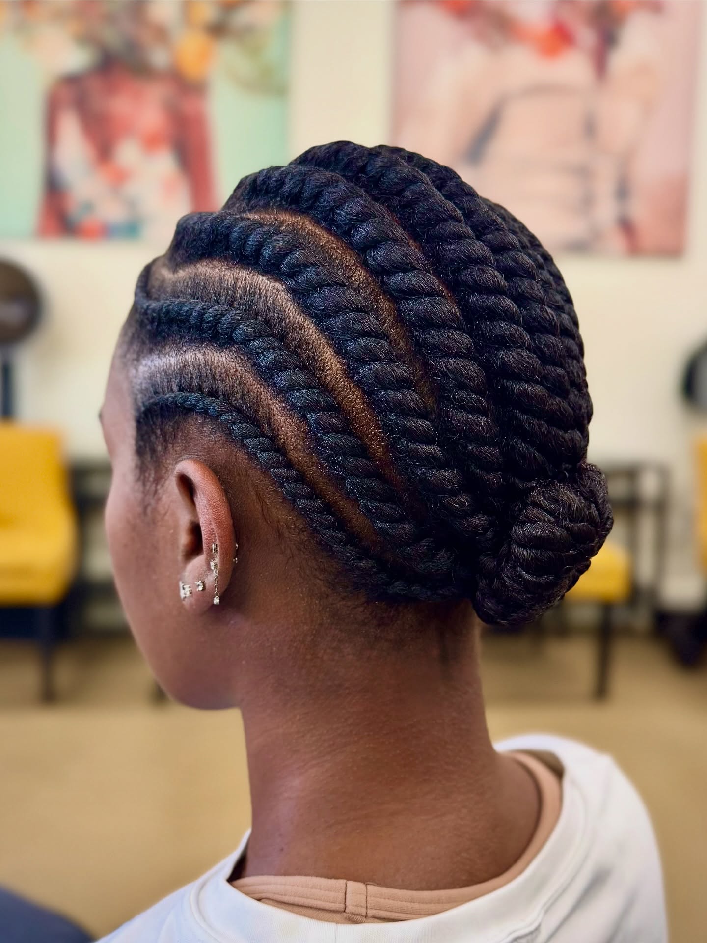 25 Protective Styles for Natural Hair Trends 2026 21 Flat Twist Updo With Natural Black Coils