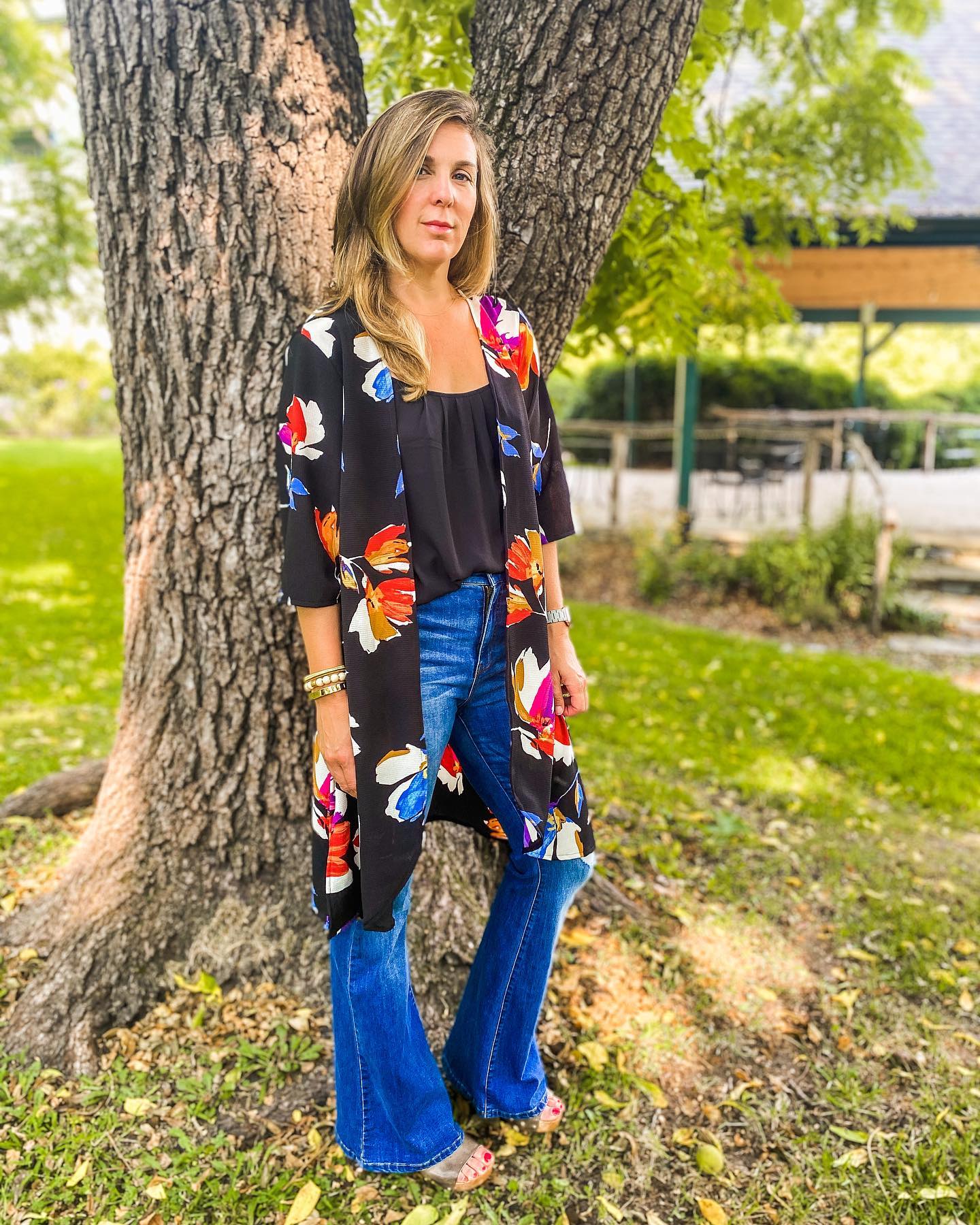 25 Fall Festival Outfits You Need for 2026 17 Floral Kimono With Flared Denim Festival Look