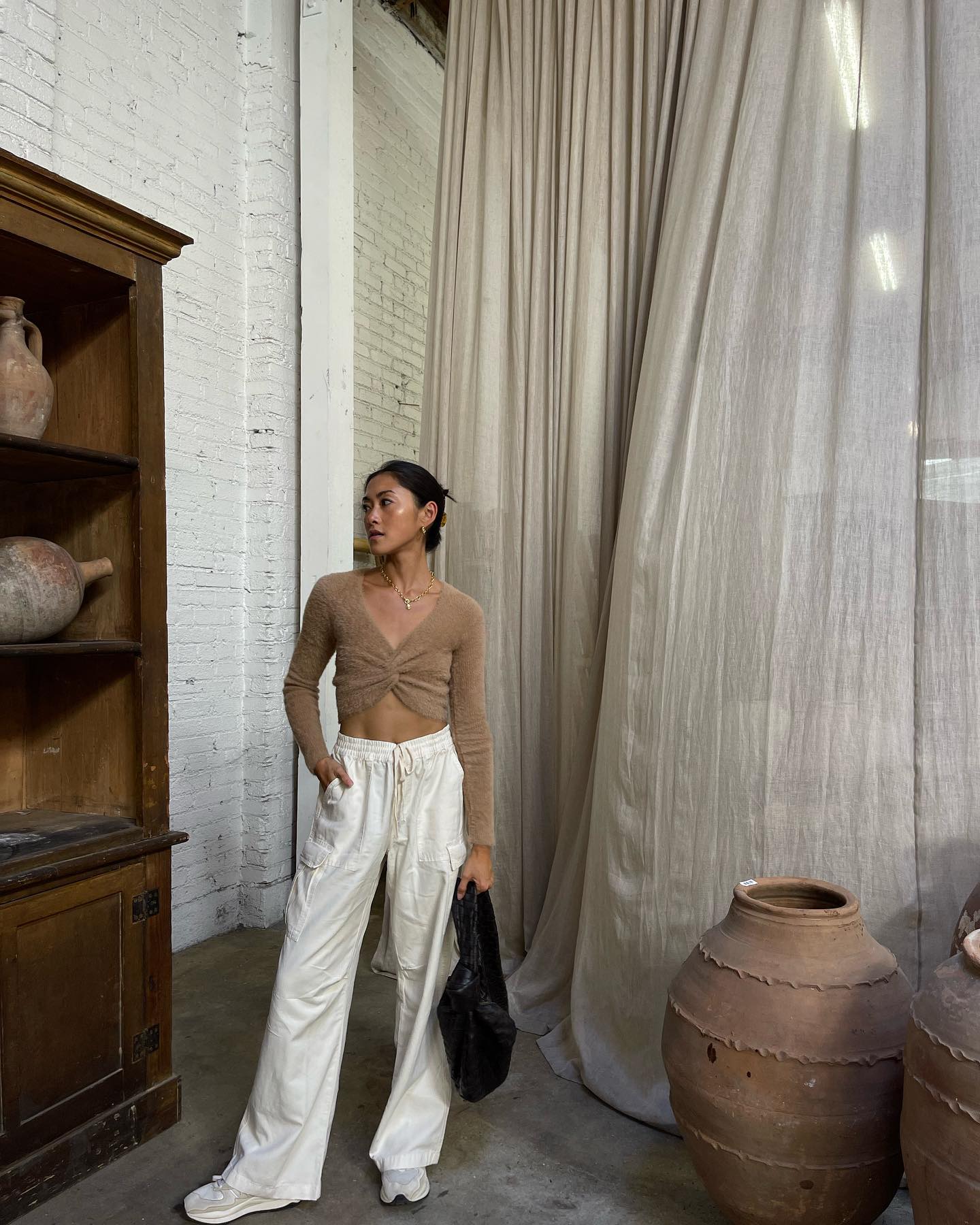 30 Transitional Fall Outfits You Need Now 12 Fuzzy Twist Crop Top And Cargo Pant Duo