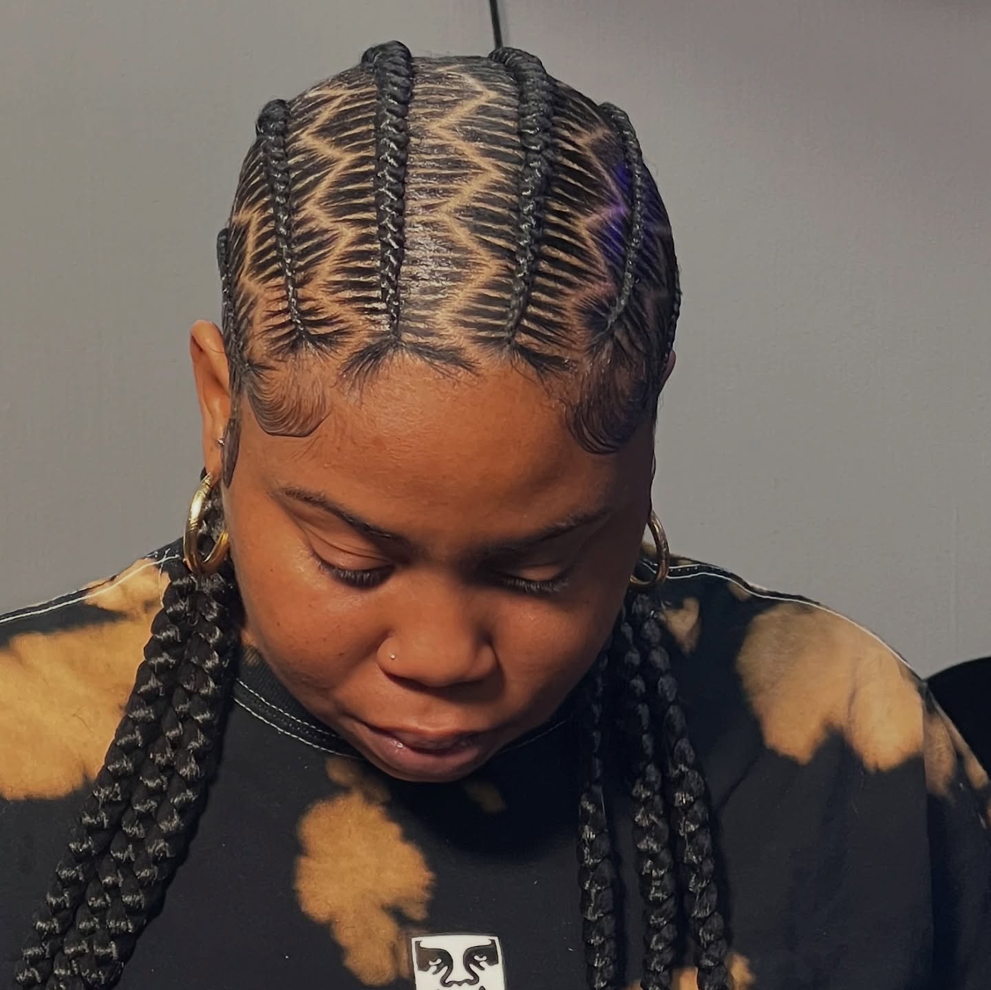 25 Protective Styles for Natural Hair Trends 2026 10 Geometric Cornrow Braids With Accent Color