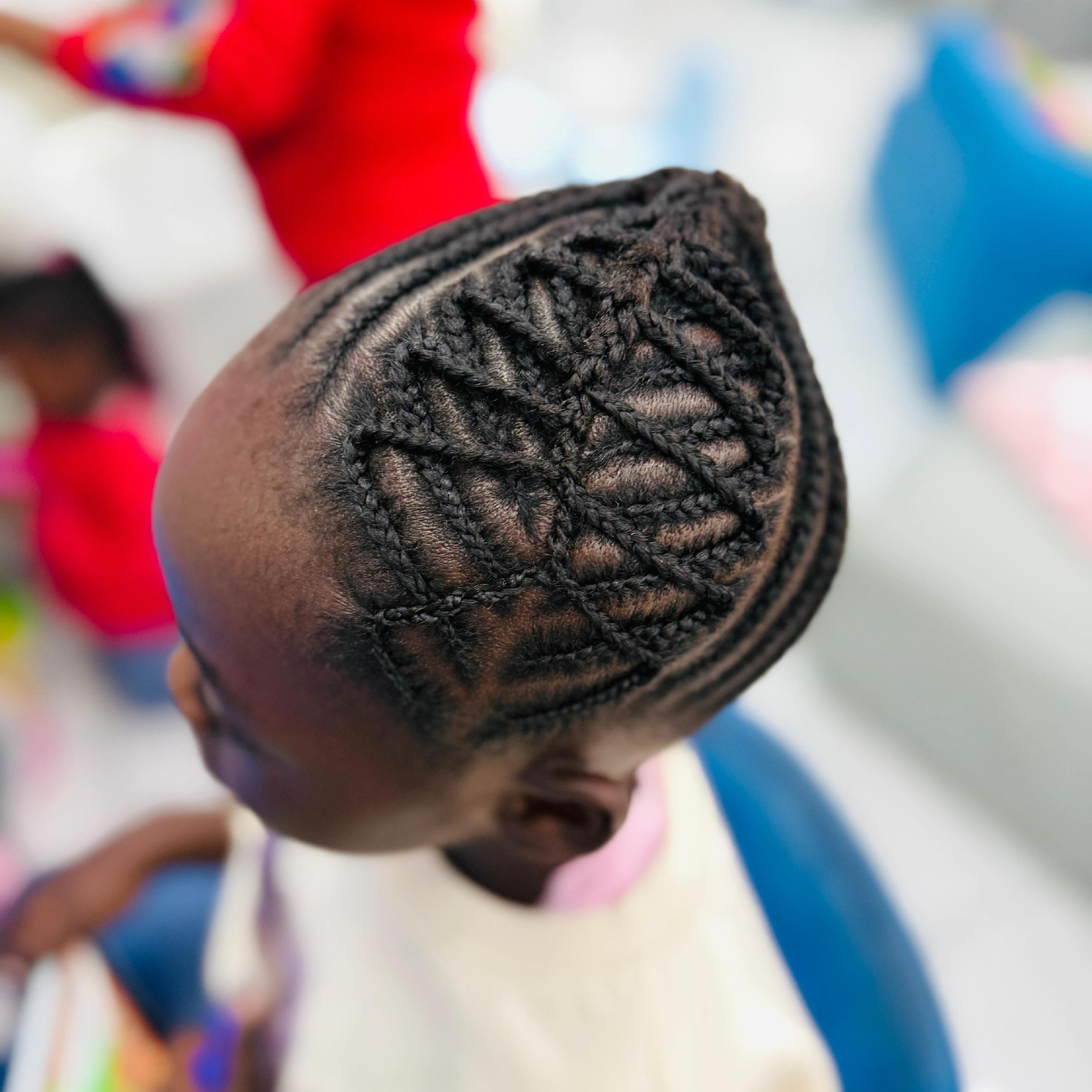 25 Protective Styles for Natural Hair Trends 2026 24 Geometric Cornrow Braids With Diamond Parting