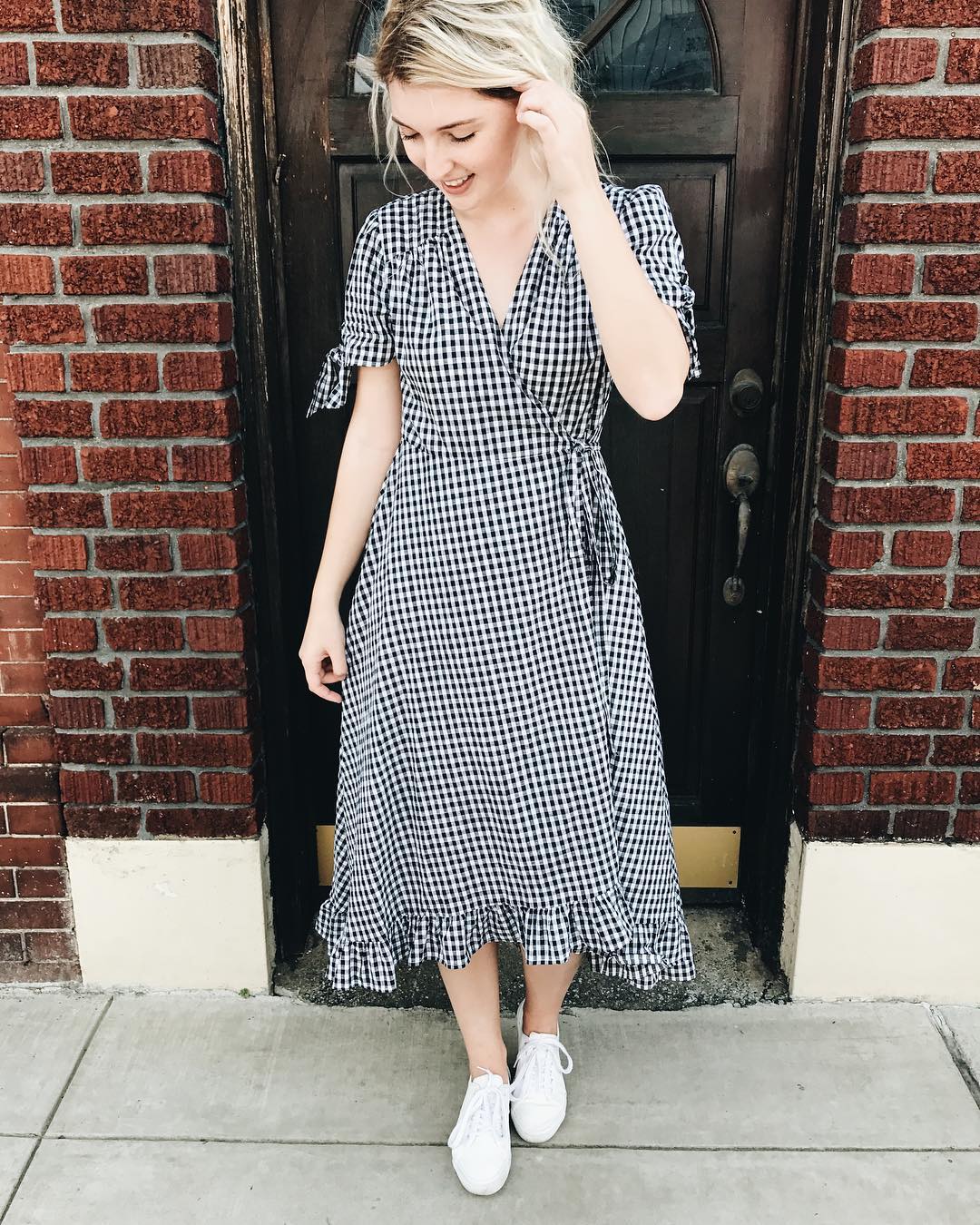 25 Fall Festival Outfits You Need for 2026 14 Gingham Wrap Dress With White Sneakers