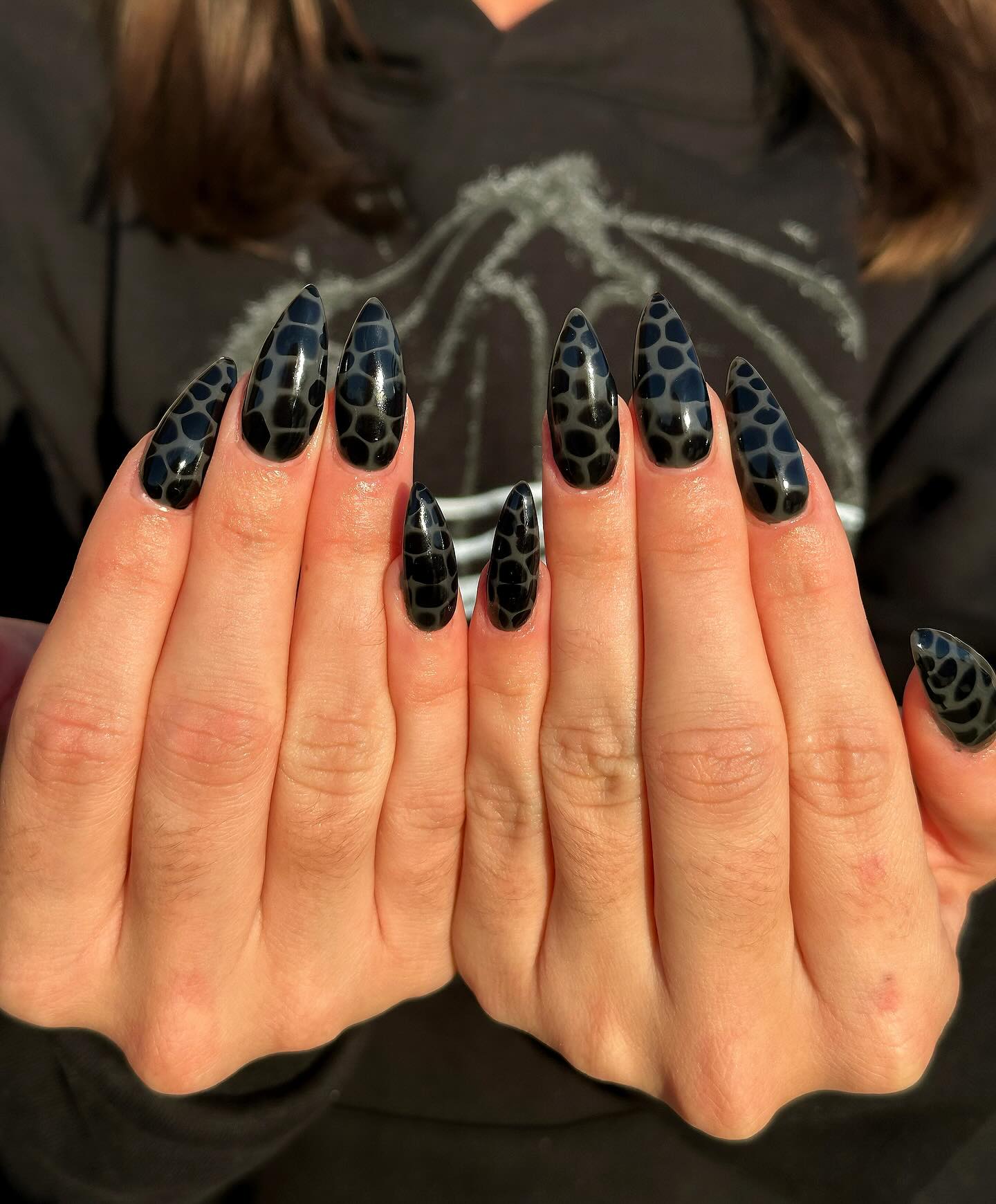 Glossy Black Leopard Print Stiletto Nails